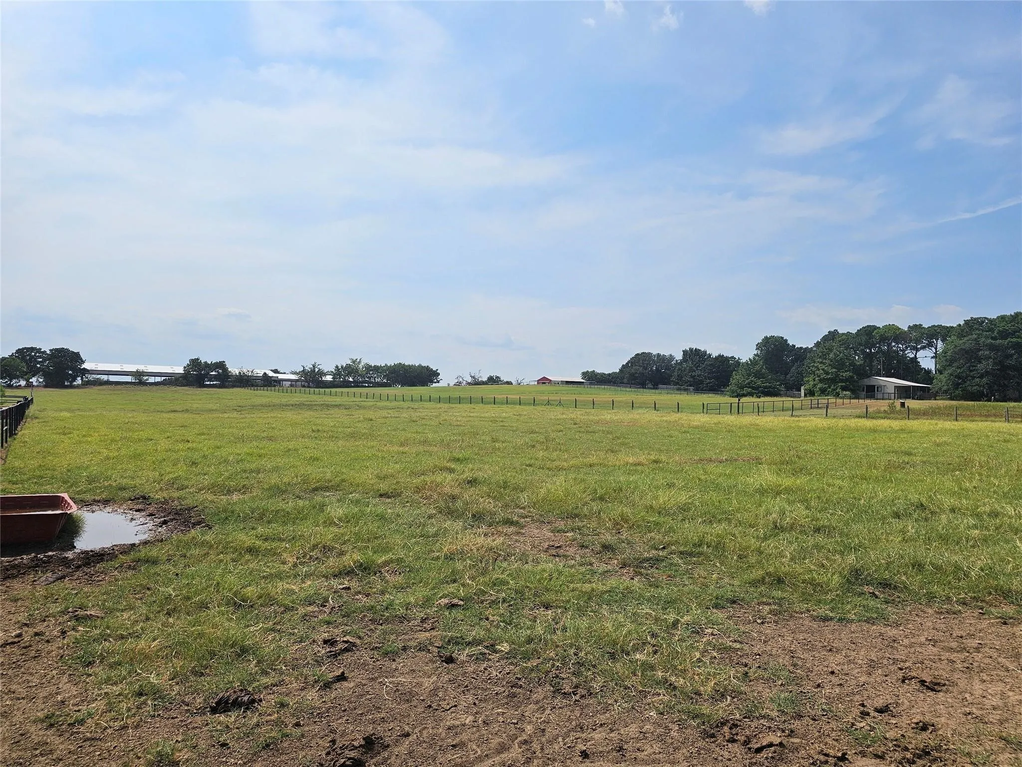 View of yard with a rural view