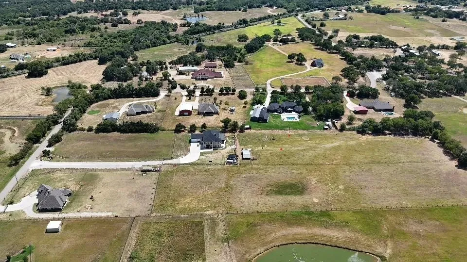 Aerial view of property's location featuring rural landscape