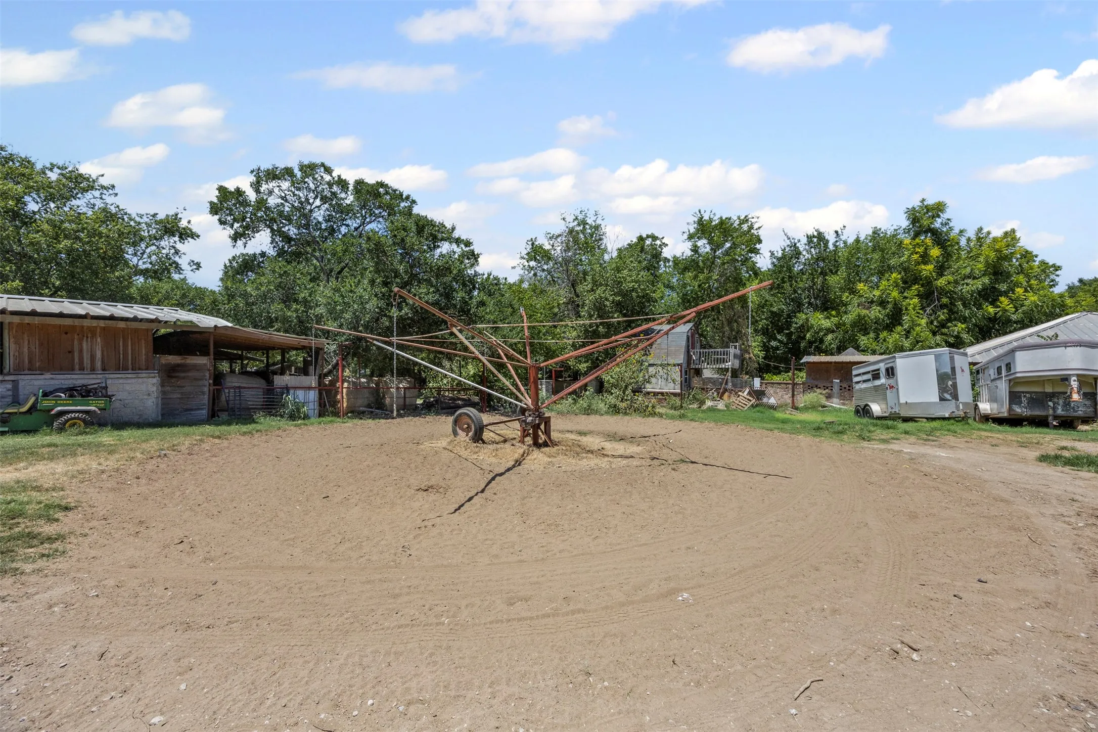 View of community featuring dirt driveway