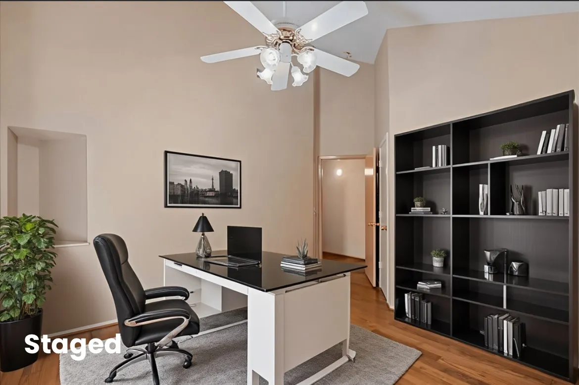 Virtual Home office featuring light wood-style floors and high vaulted ceiling