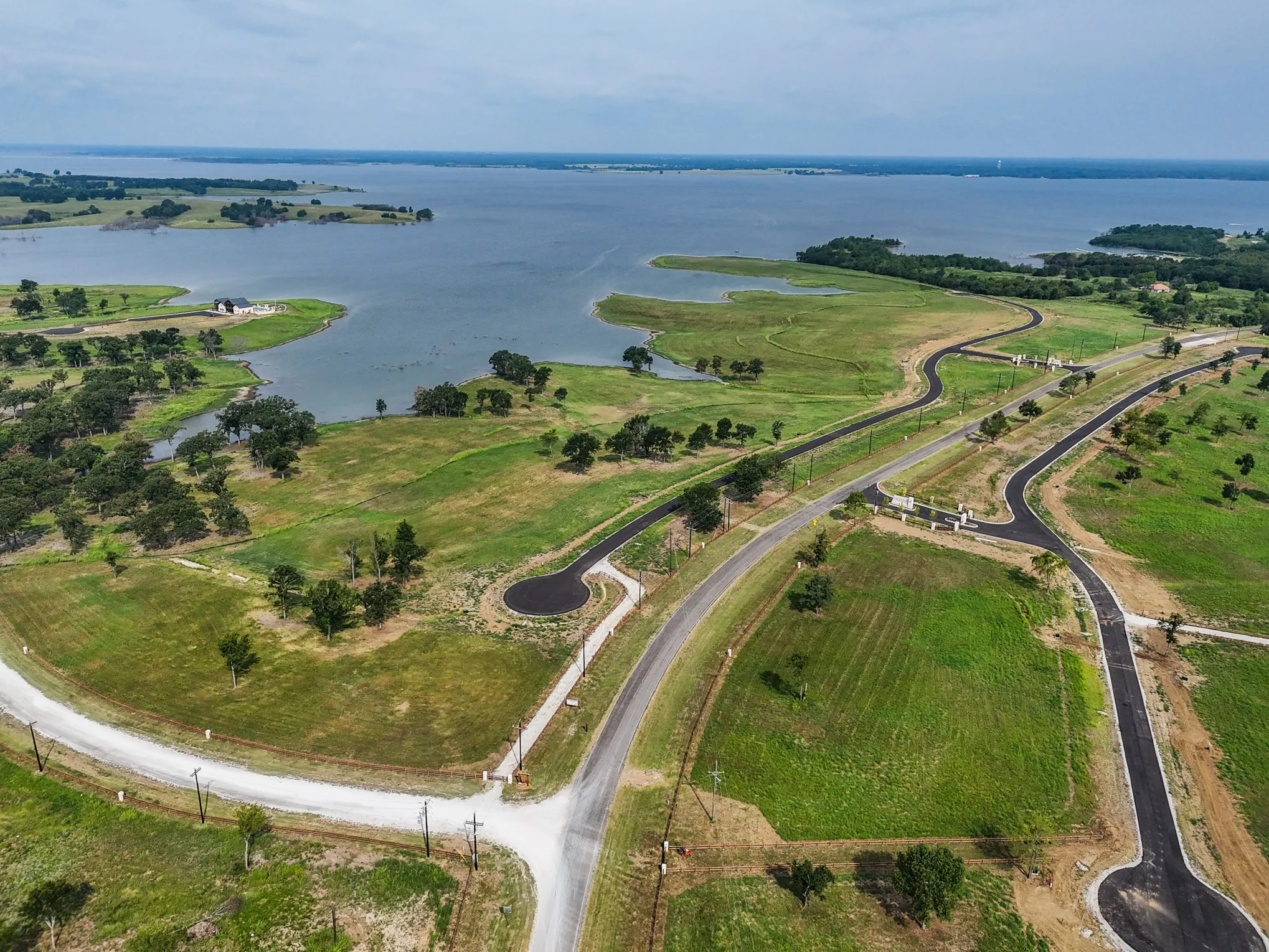 Aerial overview of property's location featuring a nearby body of water