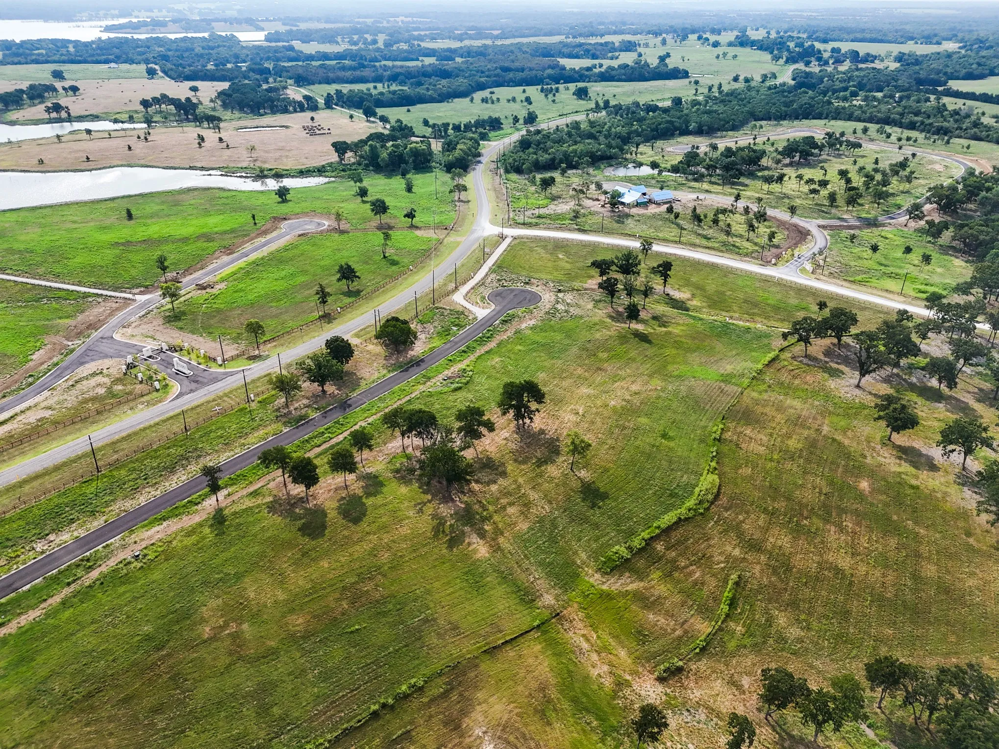 View of property location featuring a nearby body of water and rural landscape
