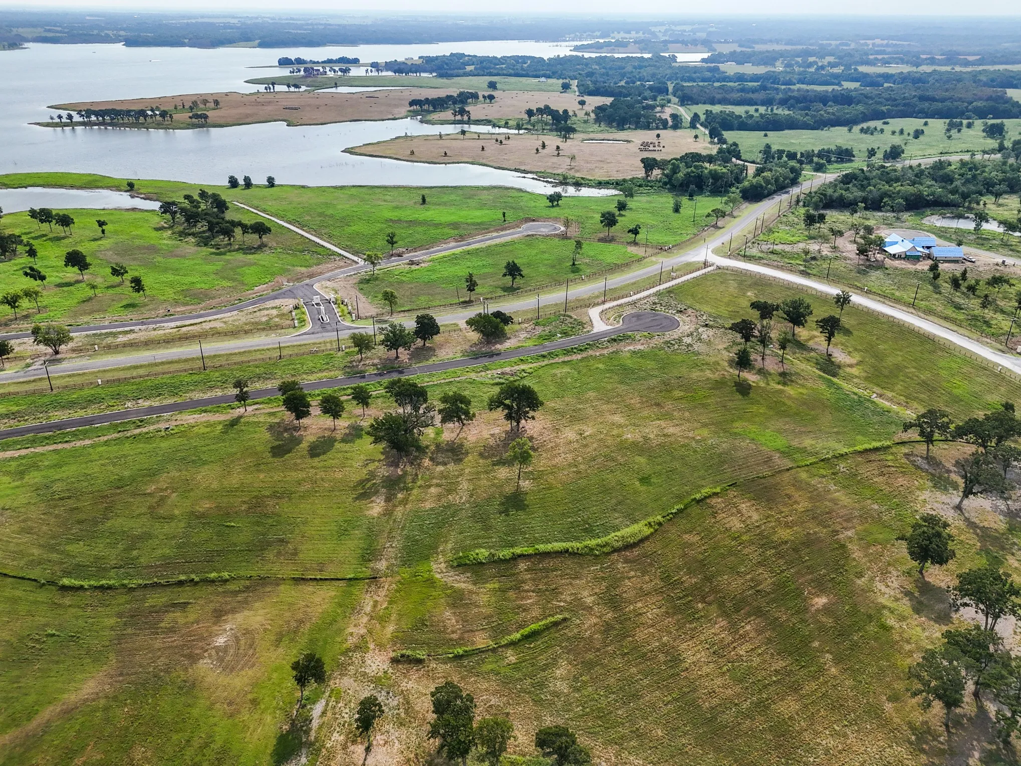 View of property location with a large body of water and rural landscape