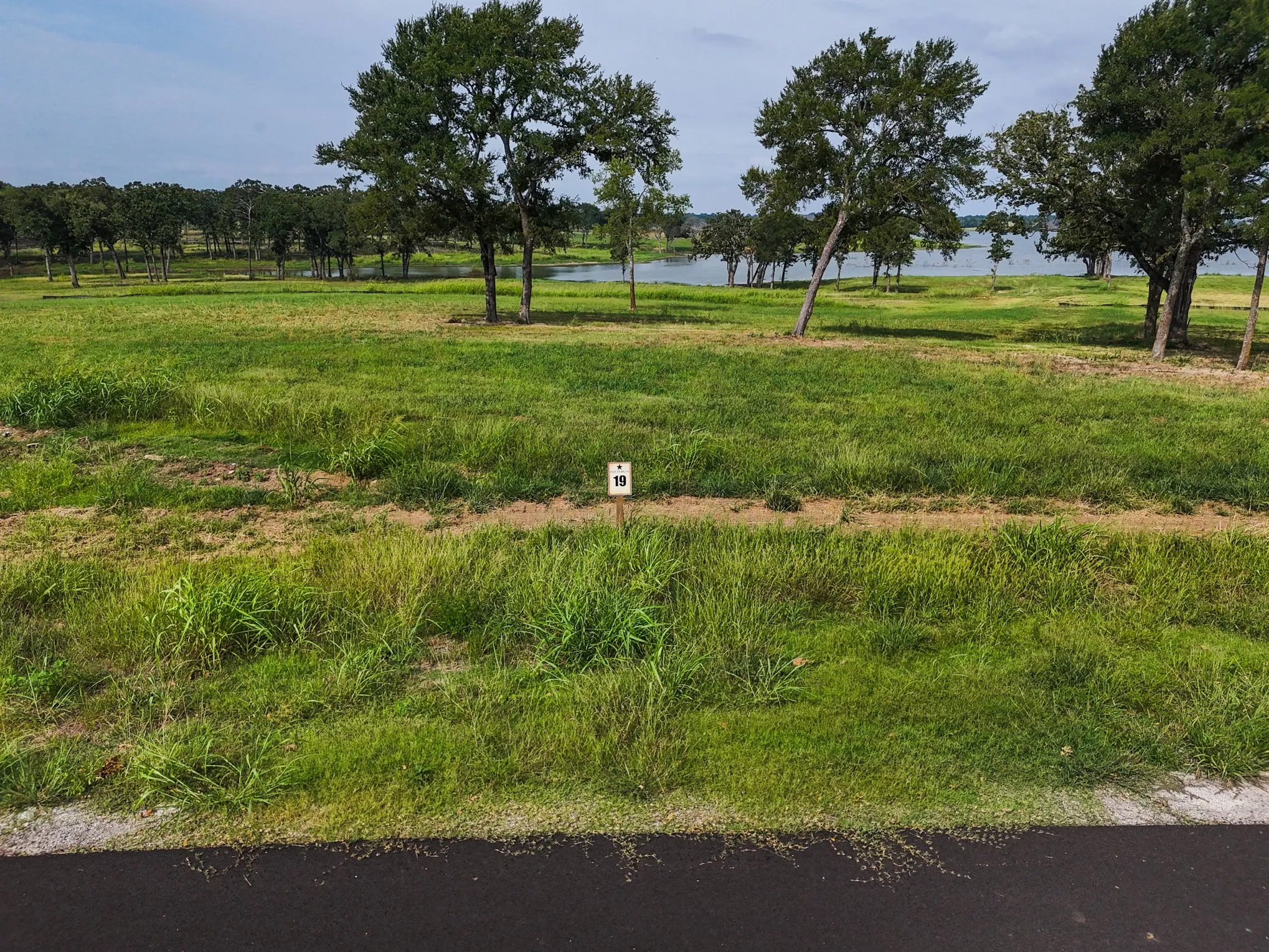 View of yard with a water view