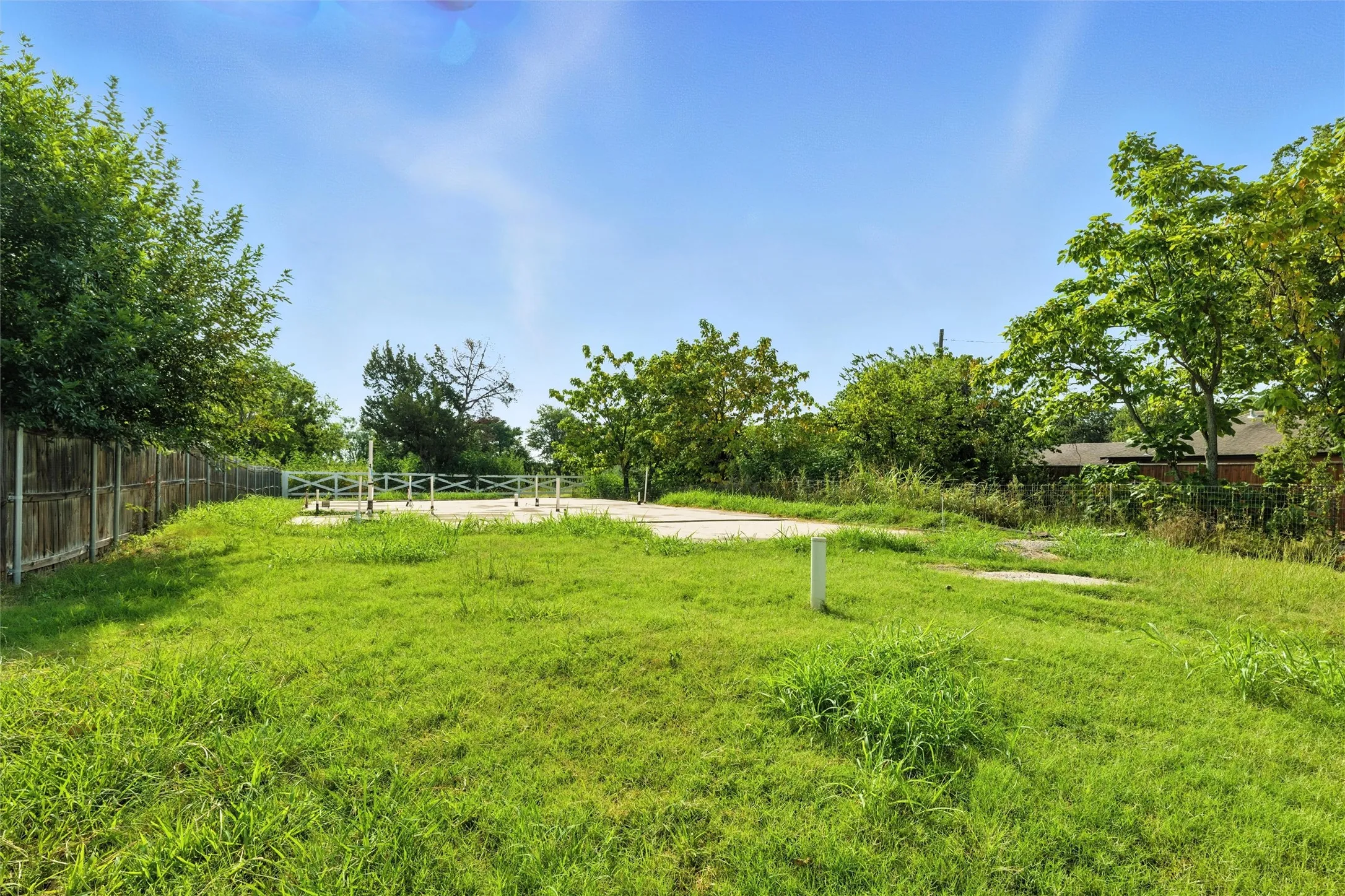 View of yard with a rural view