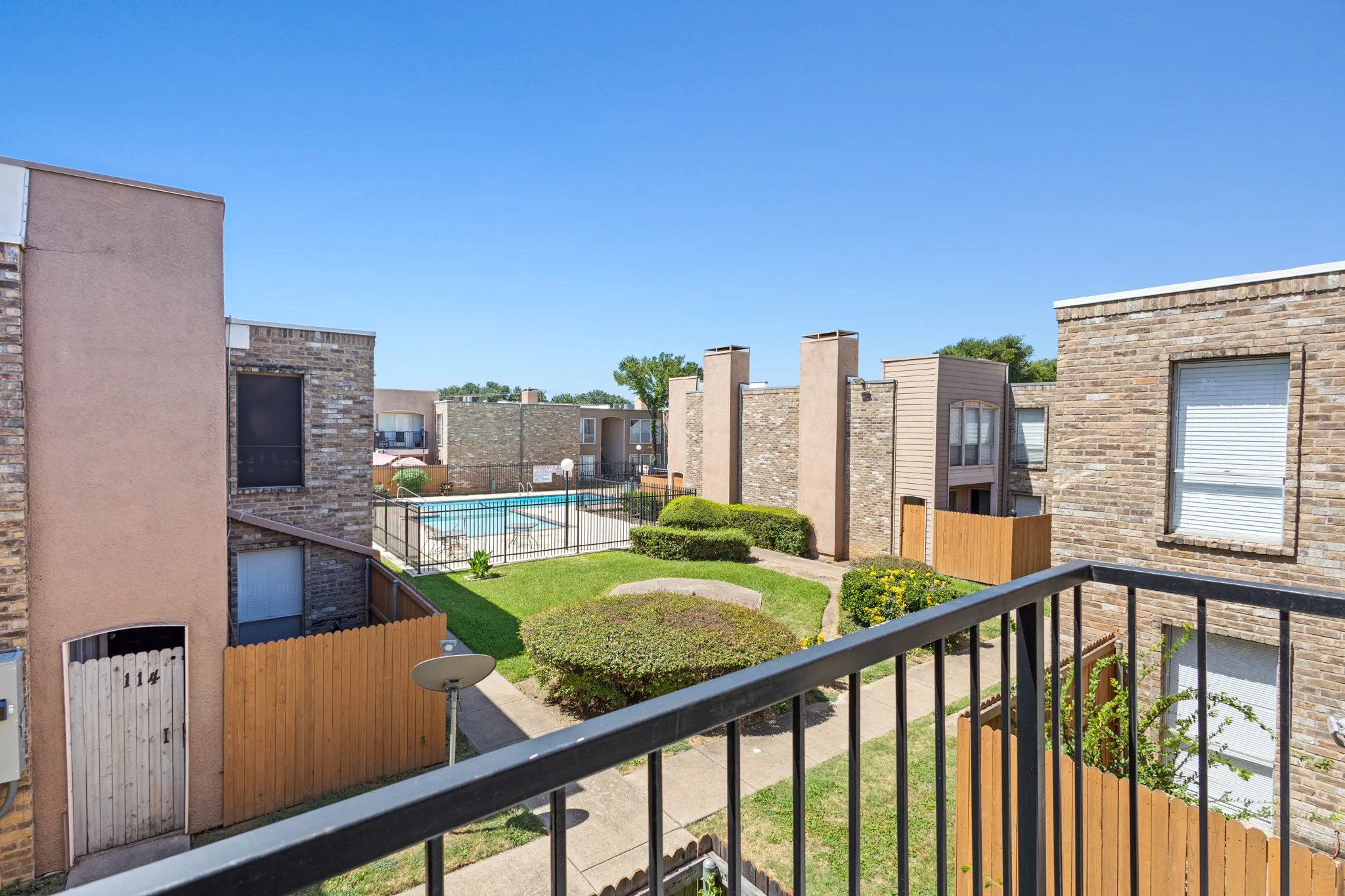 Balcony with view of pool