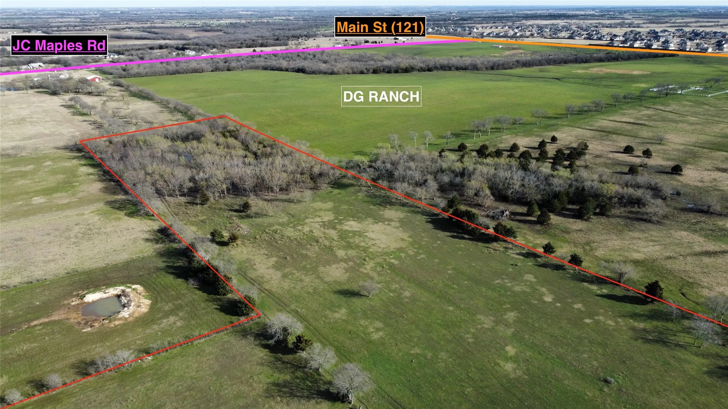 Aerial view of sparsely populated area featuring property boundaries highlighted