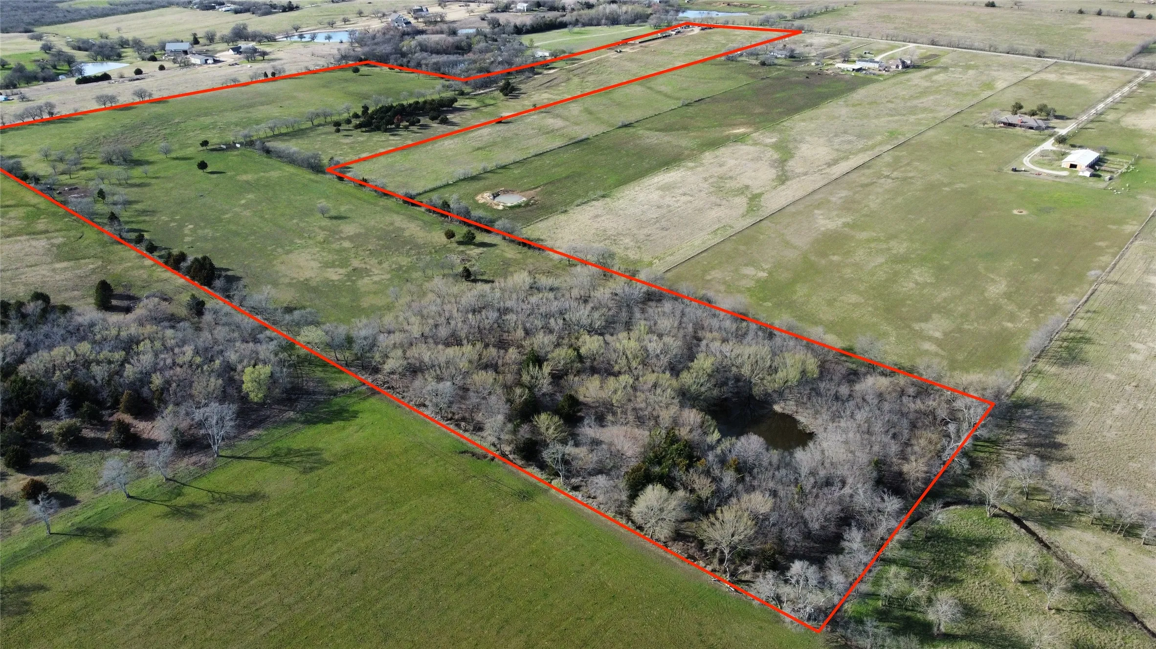 Overview of rural landscape featuring property boundaries highlighted