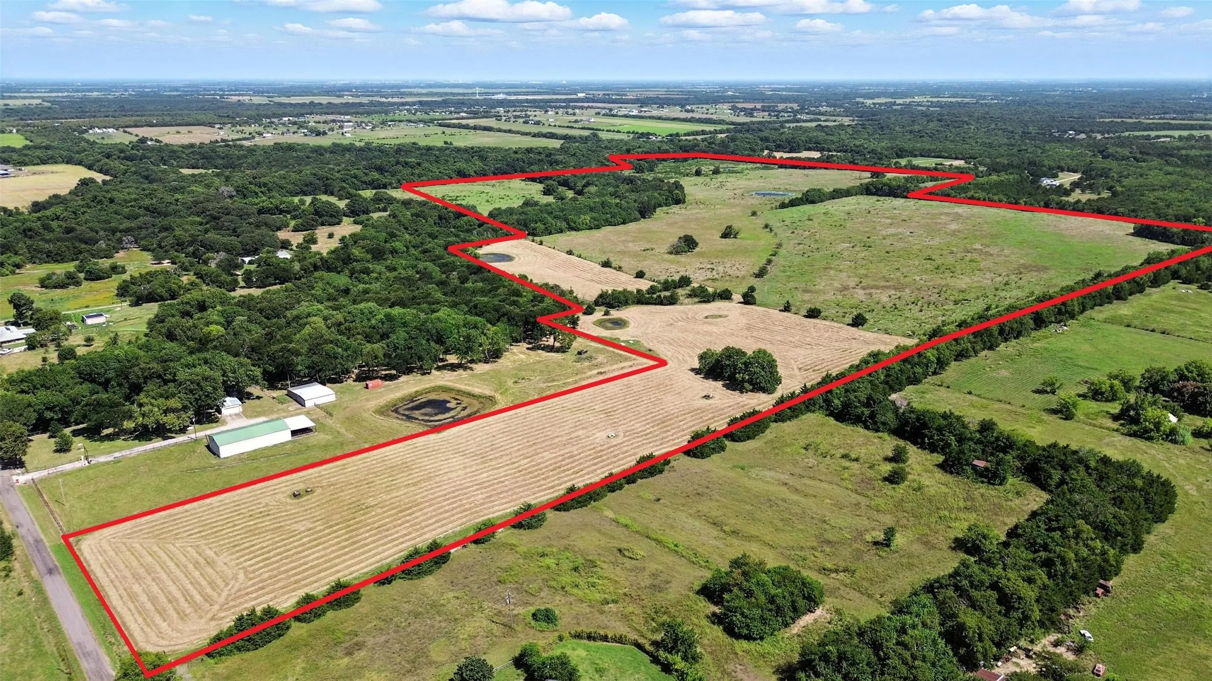 Overview of rural landscape with property boundaries highlighted