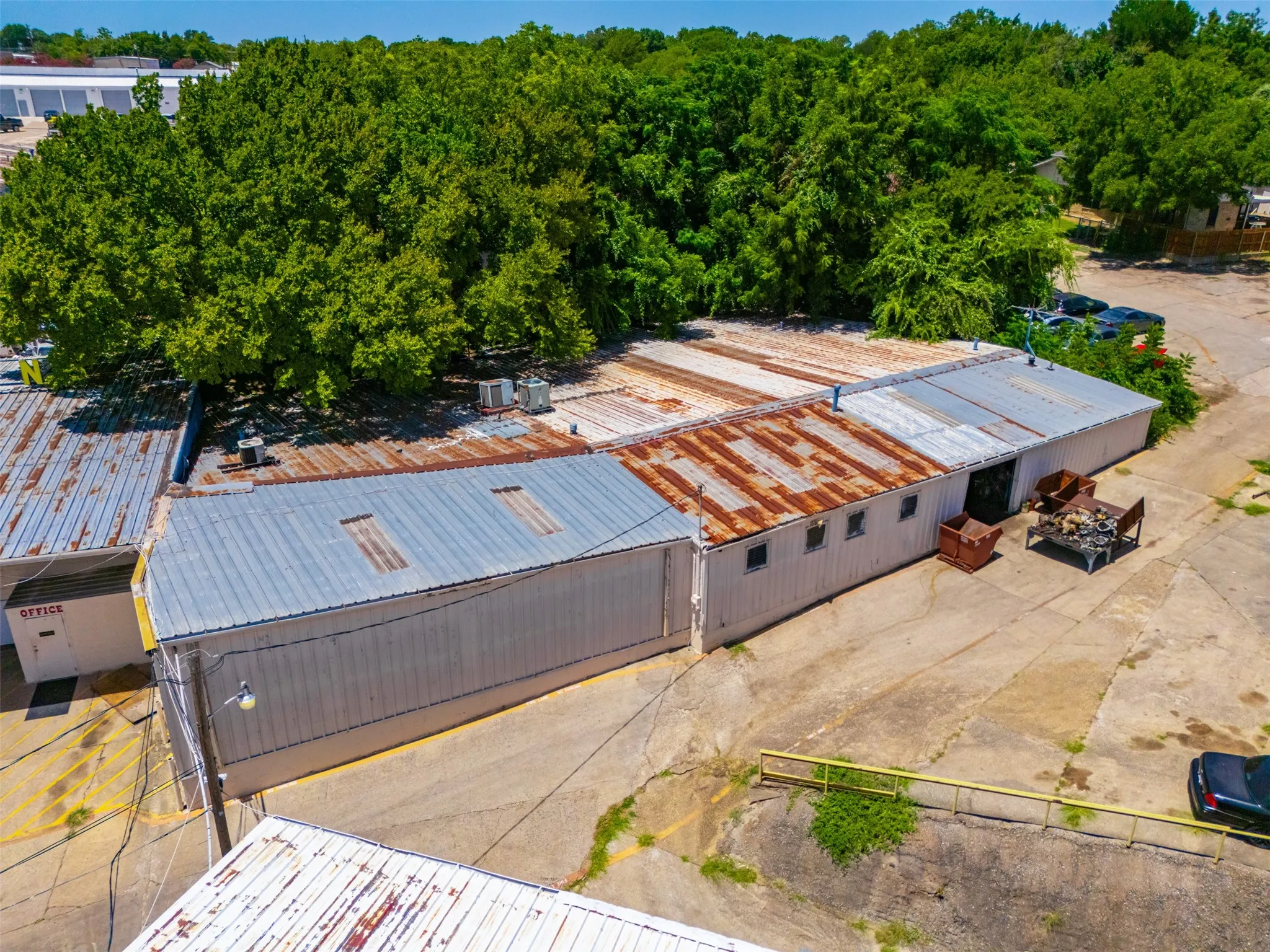 Drone / aerial view of a heavily wooded area