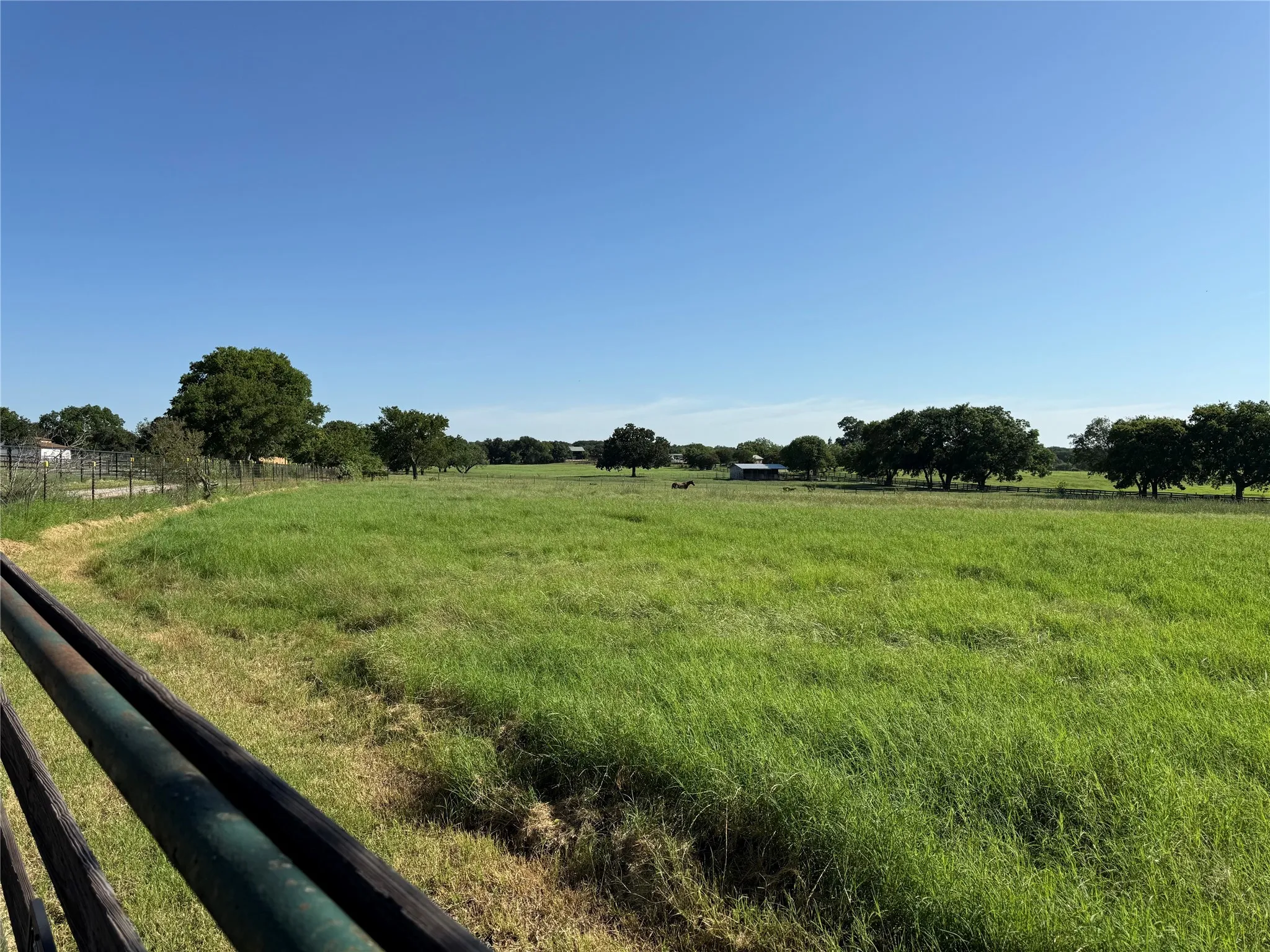 View of yard with a rural view