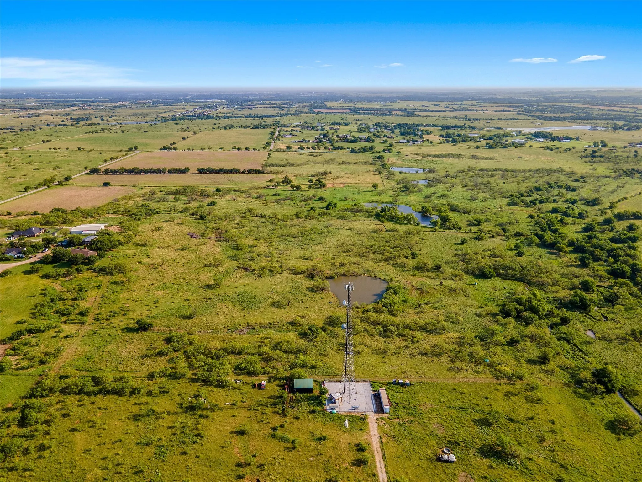 View of property location featuring rural landscape and a large body of water