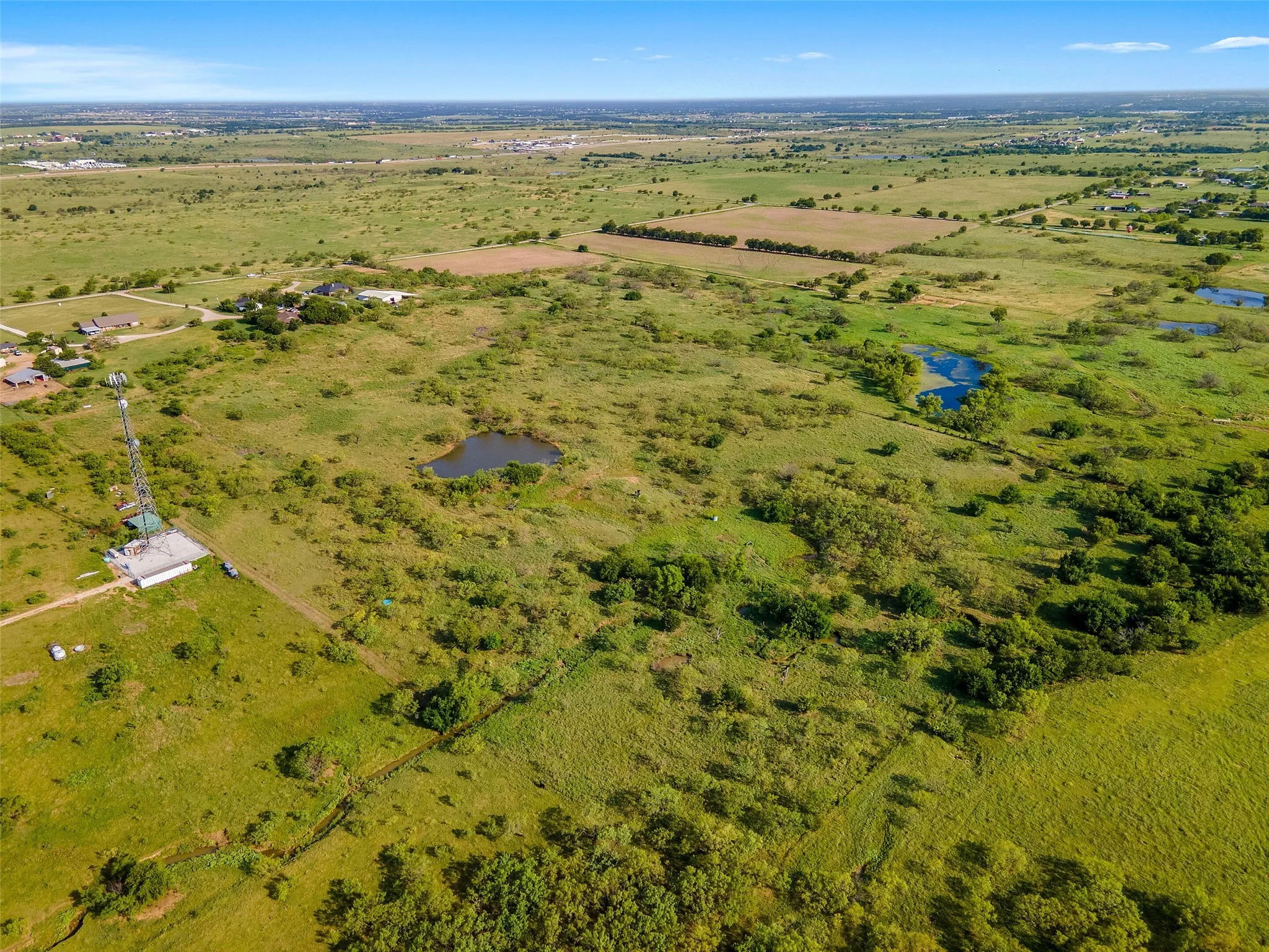 Overview of rural landscape featuring a large body of water