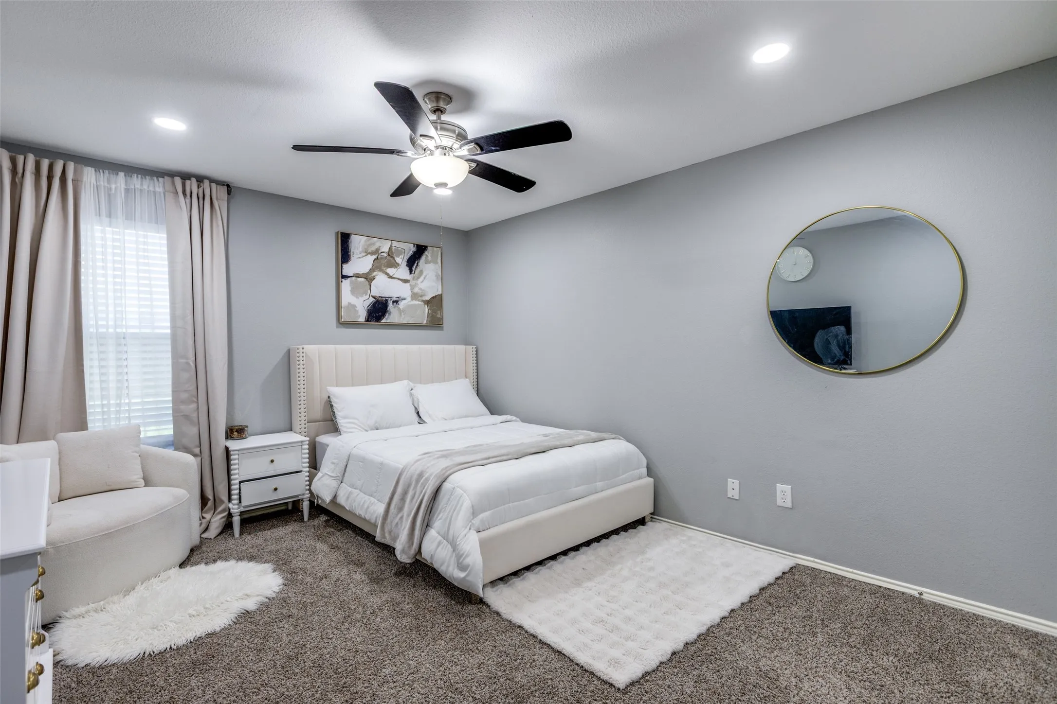 Bedroom with carpet floors, recessed lighting, and a ceiling fan