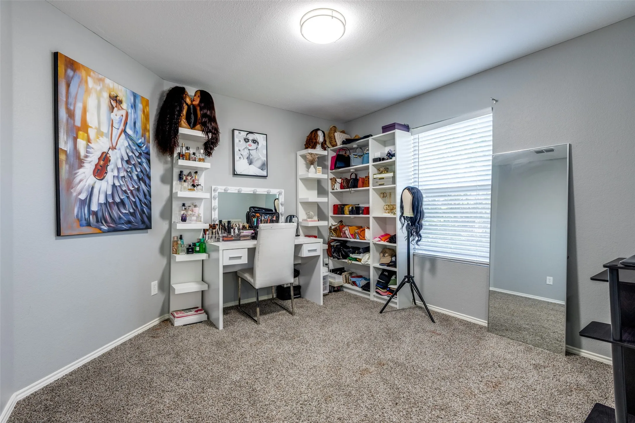 Additional space featuring carpet and baseboards