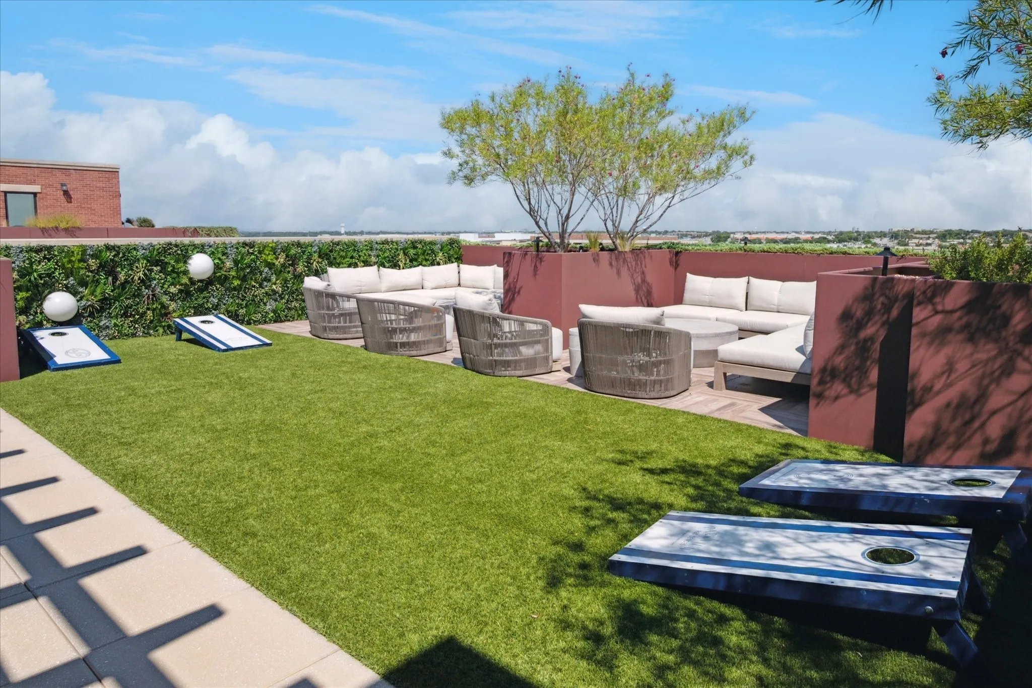 Multiple seating areas on the rooftop. Perfect for relaxing or playing lawn games.