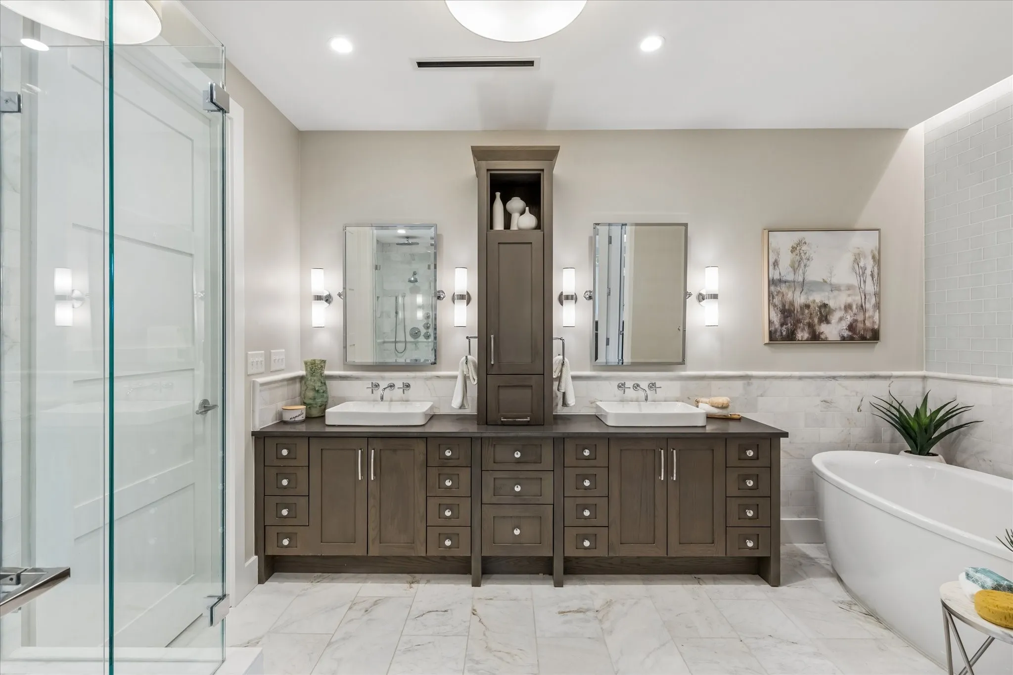 Primary Bathroom with linear drain, bench, multiple shower heads and toiletry nook