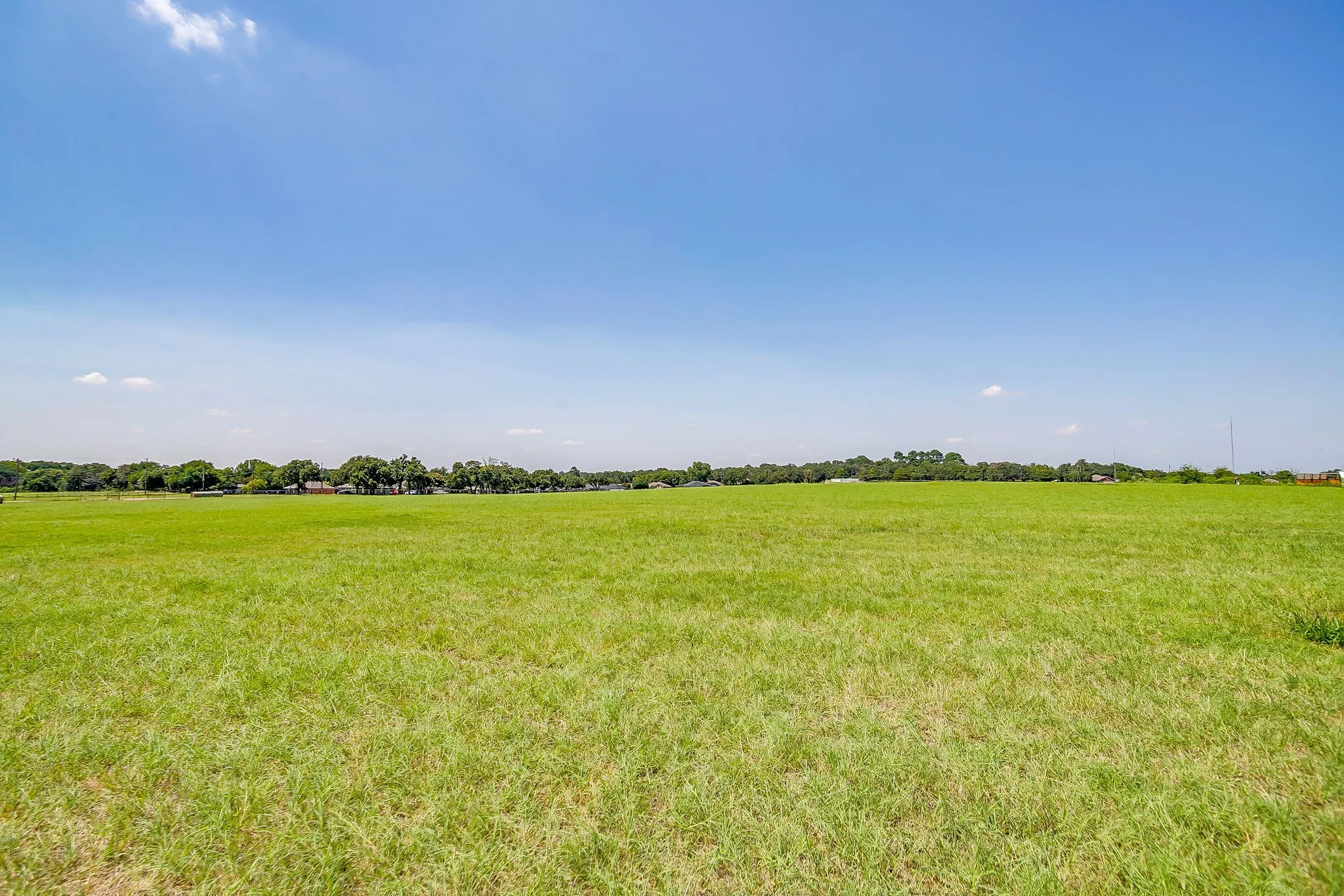 View of grassy yard with a view of rural / pastoral area