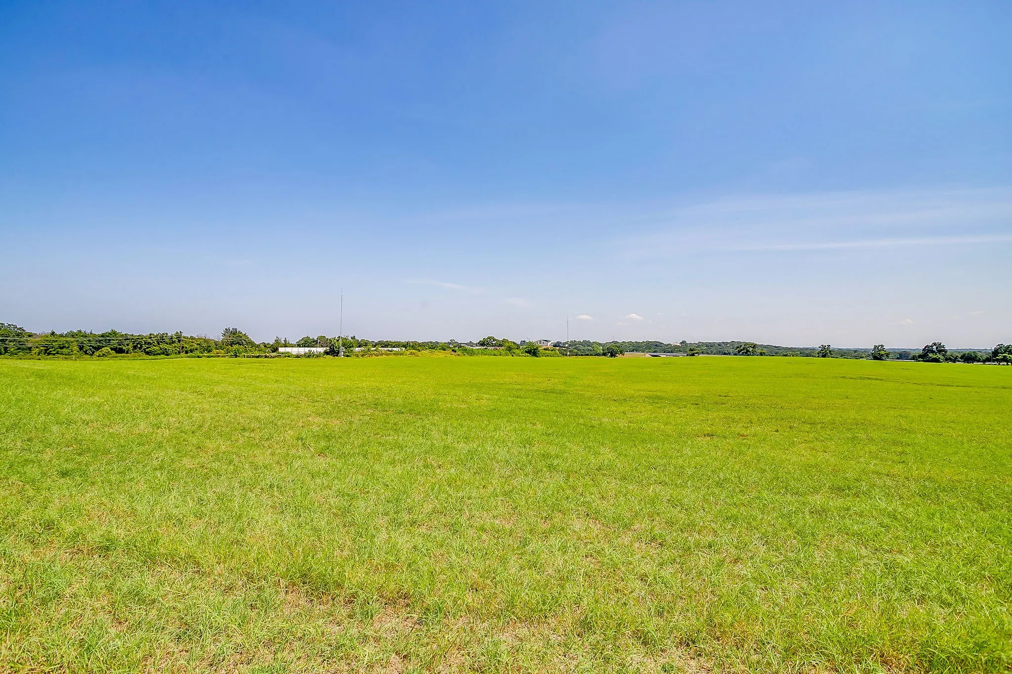 View of grassy yard with a view of rural / pastoral area