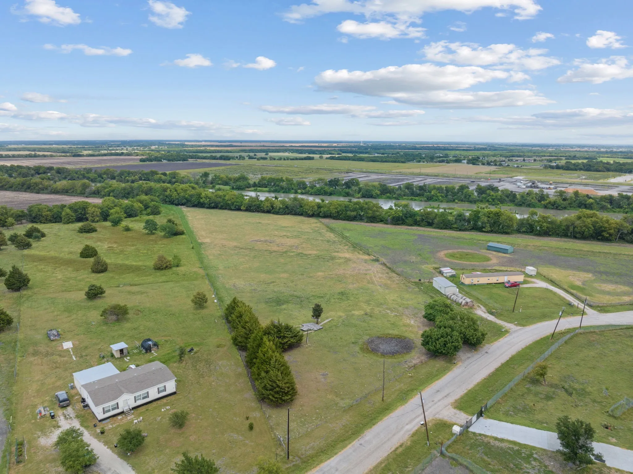 Aerial view of property's location with rural landscape