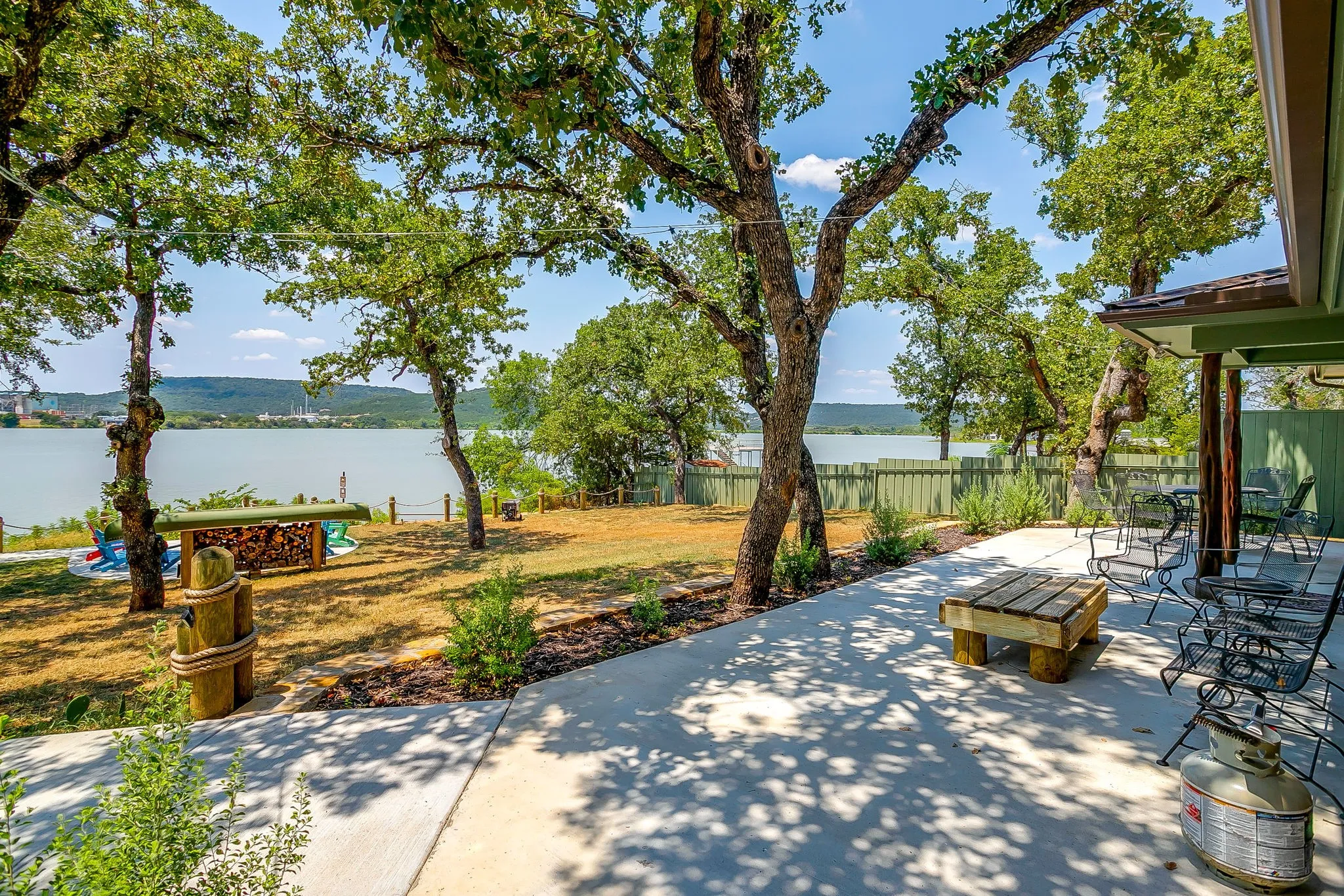 View of patio / terrace with a water view and outdoor dining space
