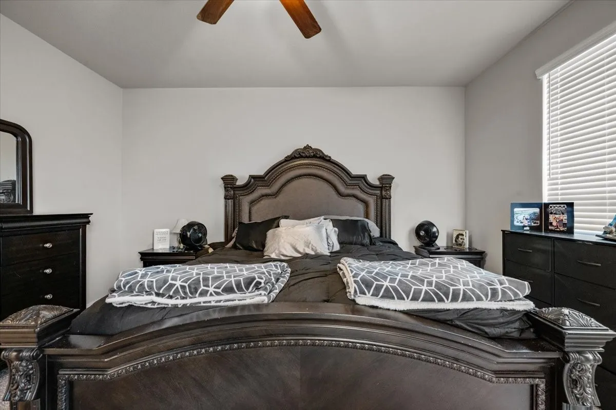 Bedroom featuring ceiling fan