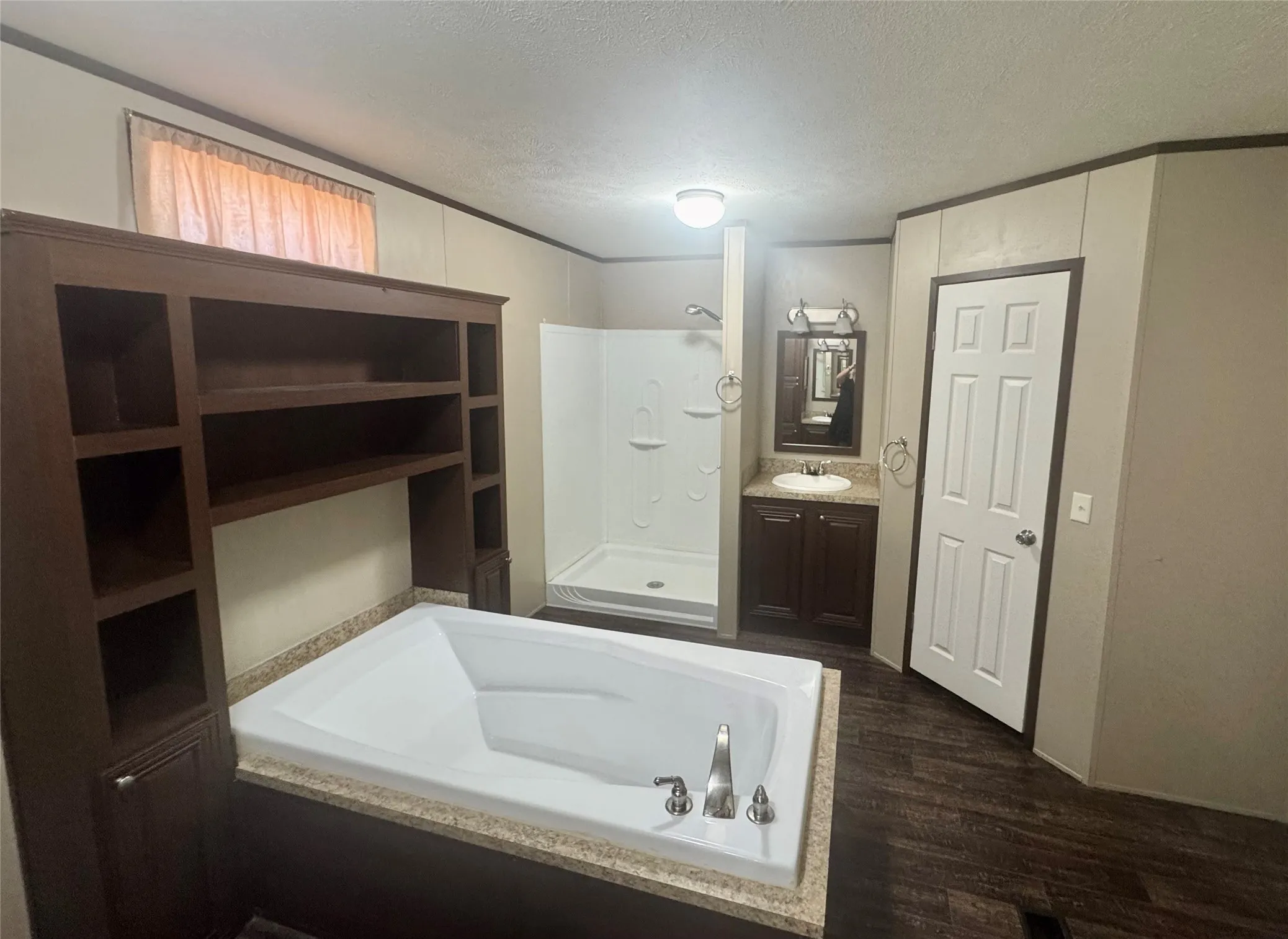 Built in shelving provides additional storage