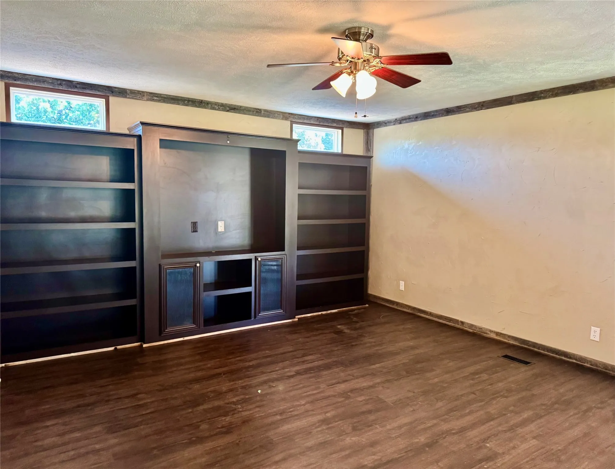 Built in cabinet in spacious living area add style and function