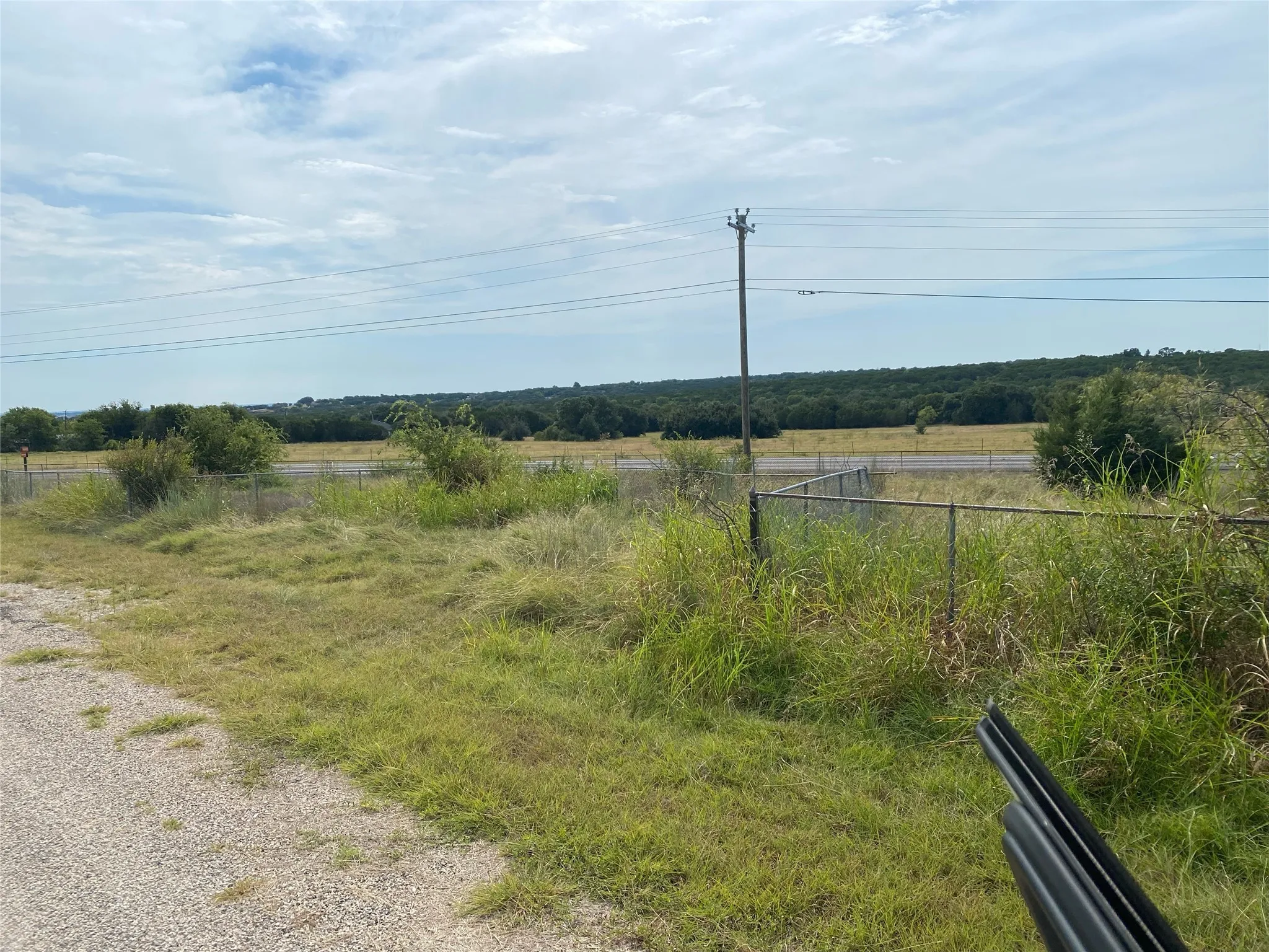 View of yard with a rural view