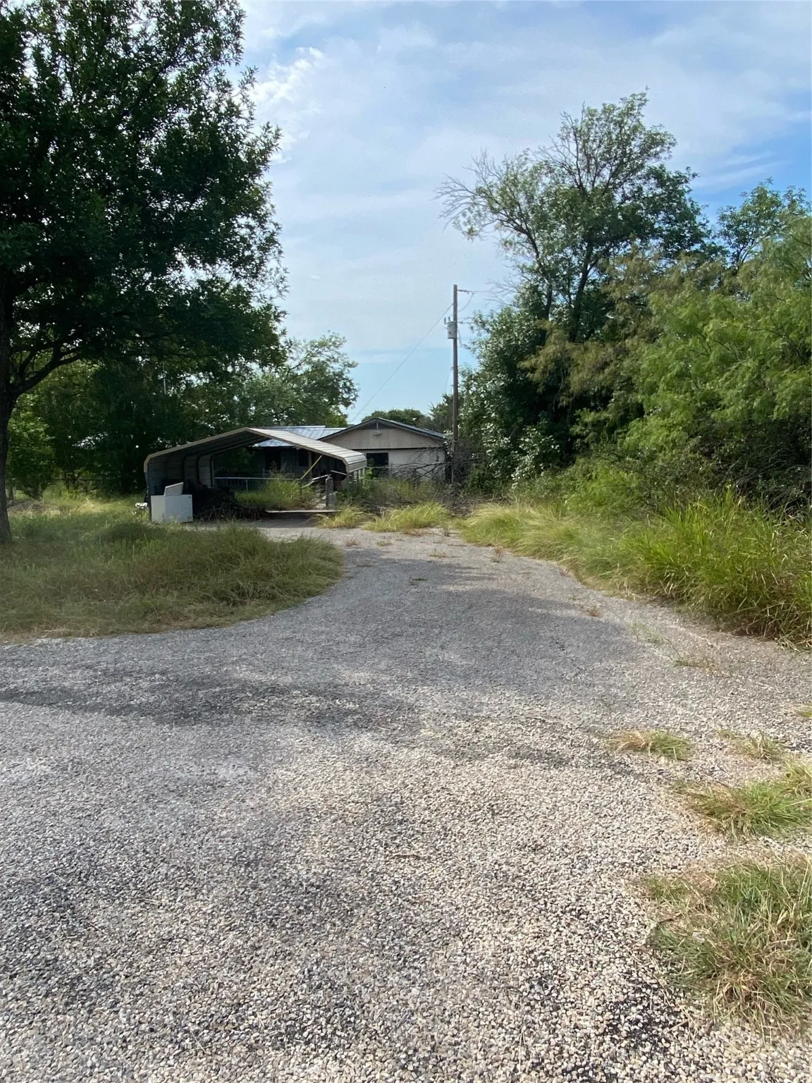 View of dirt / gravel driveway