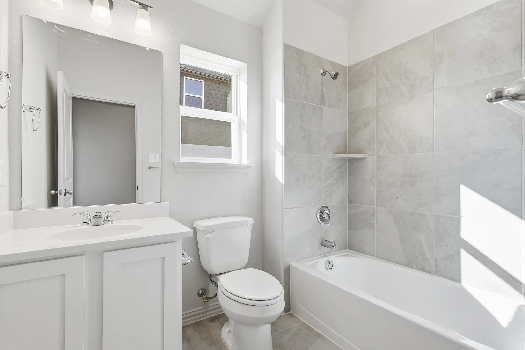 Full bathroom featuring bathing tub / shower combination and vanity