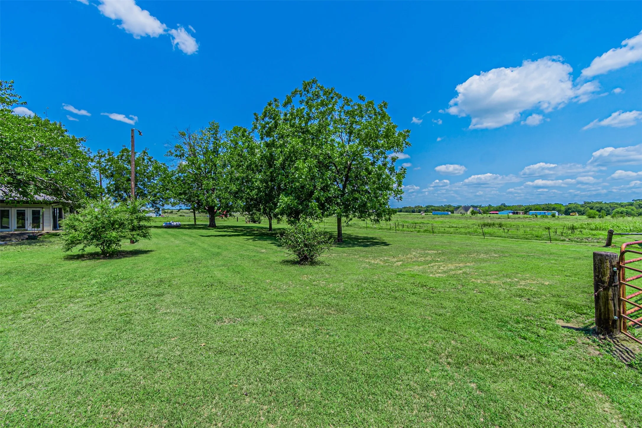View of green lawn featuring a view of countryside