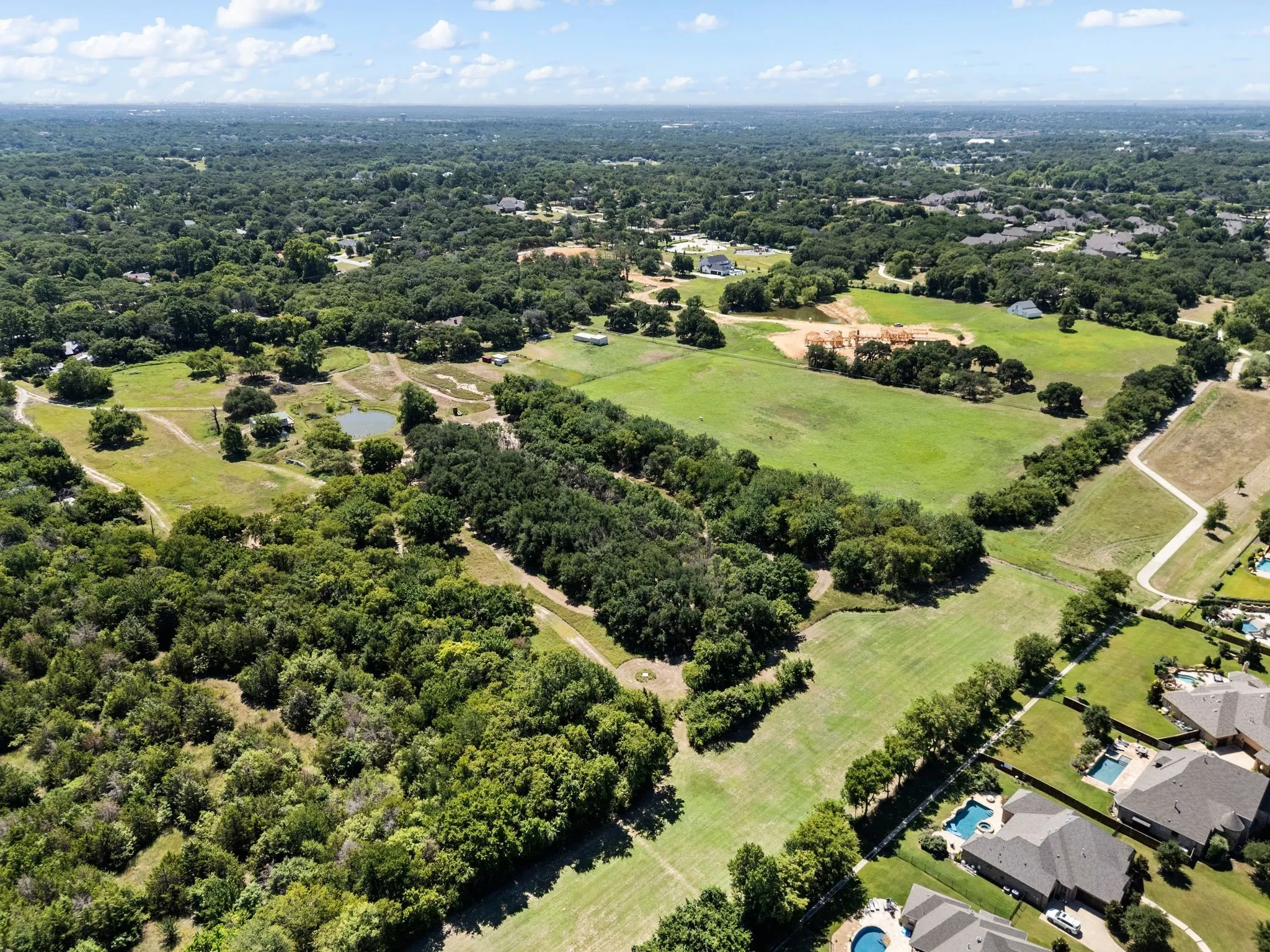 Aerial view of a heavily wooded area