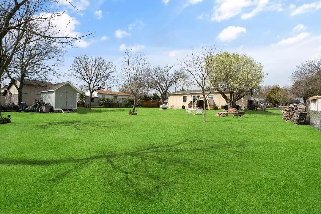 View of yard with a shed