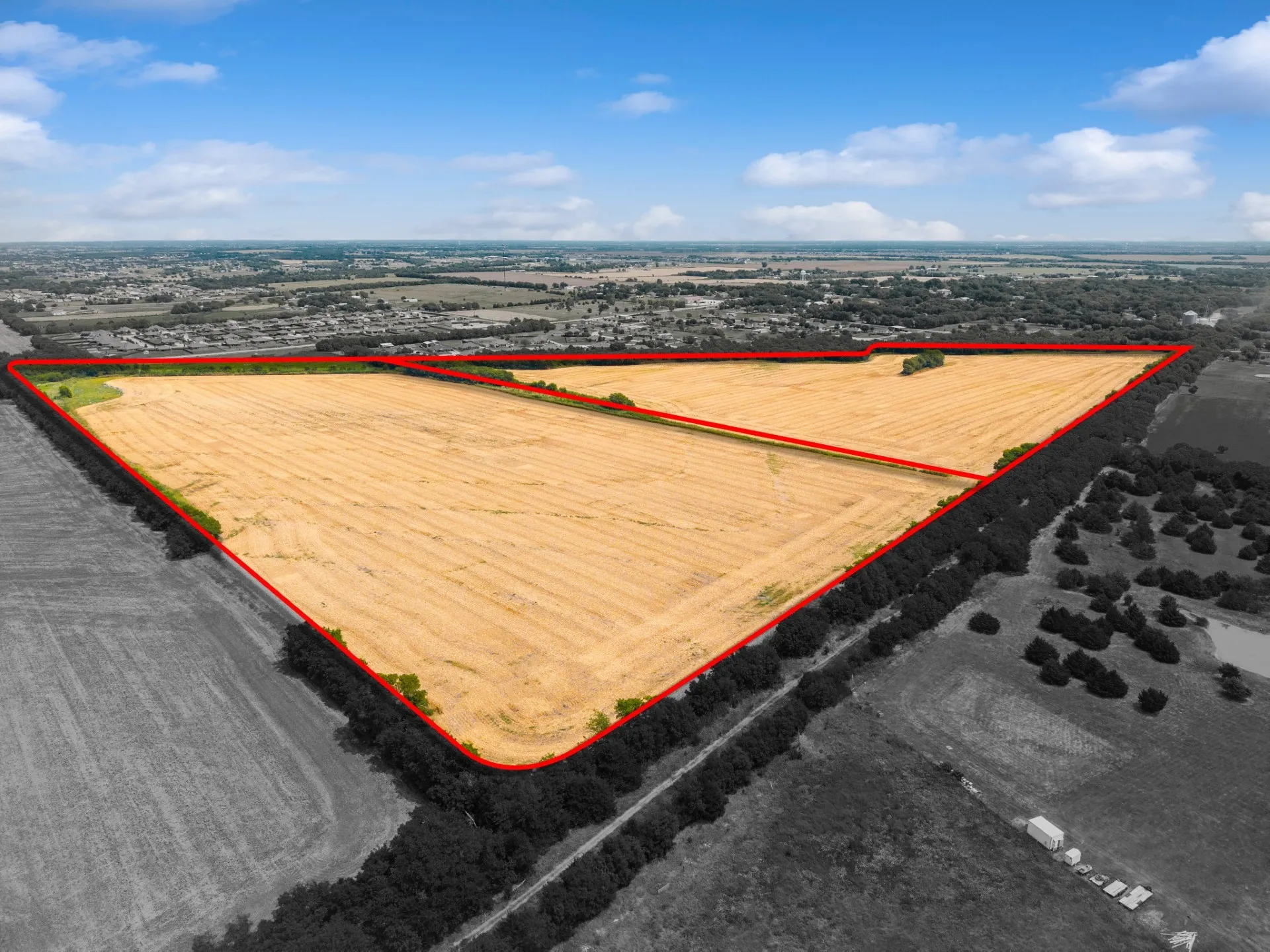 View of the 55AC + 46AC optional parcel outlined and extensive farmland