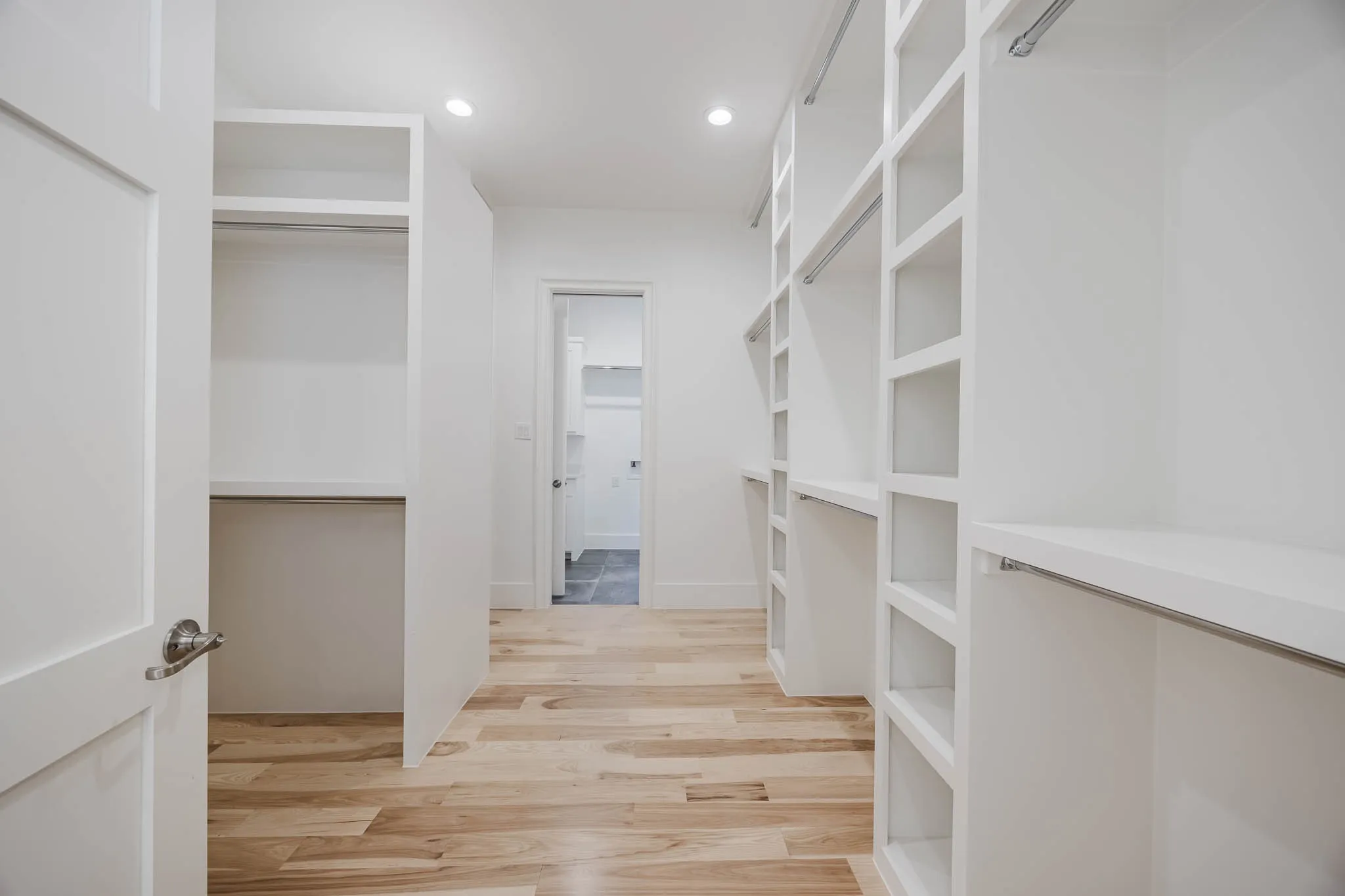 Walk in closet featuring light wood finished floors