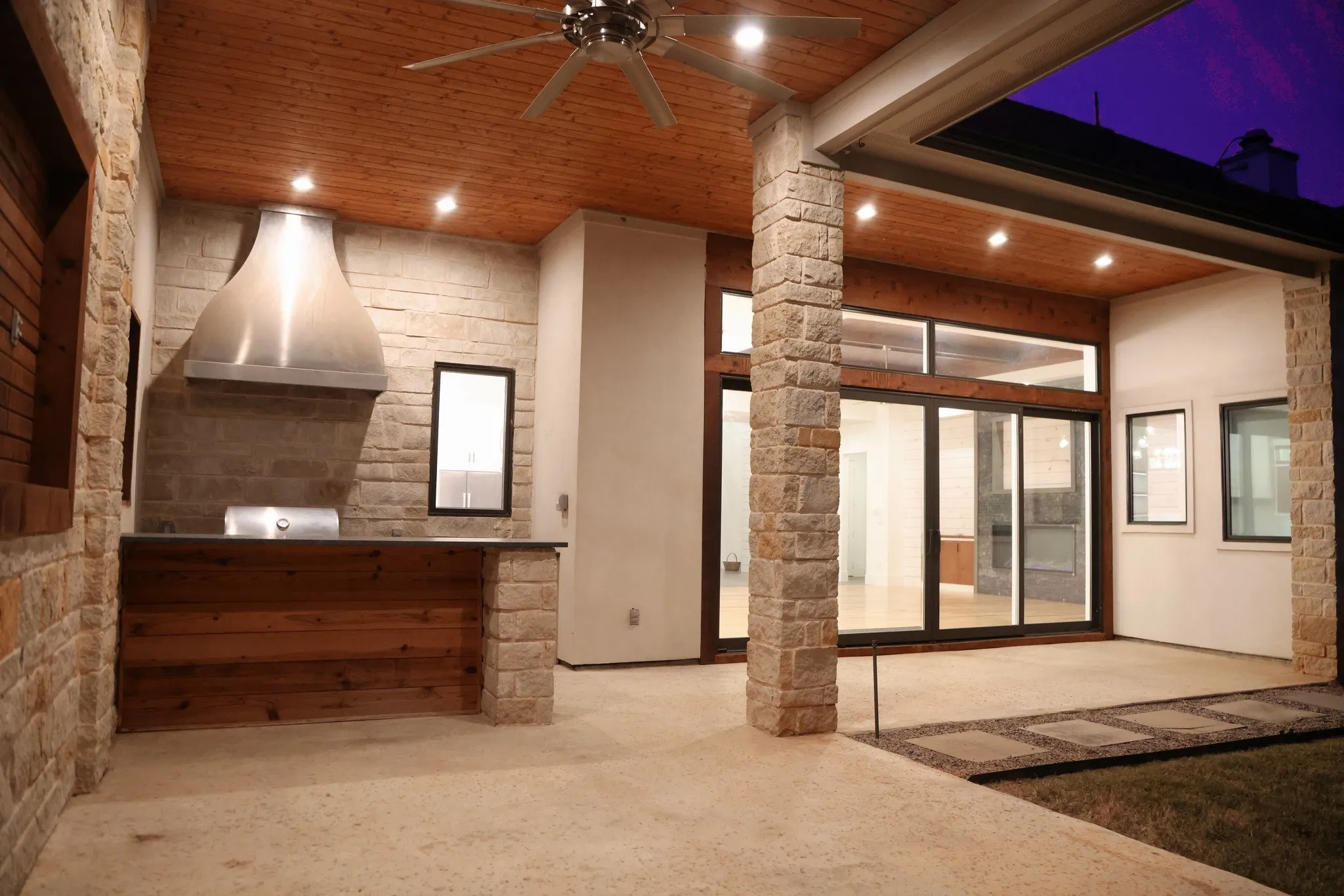 View of patio with a ceiling fan