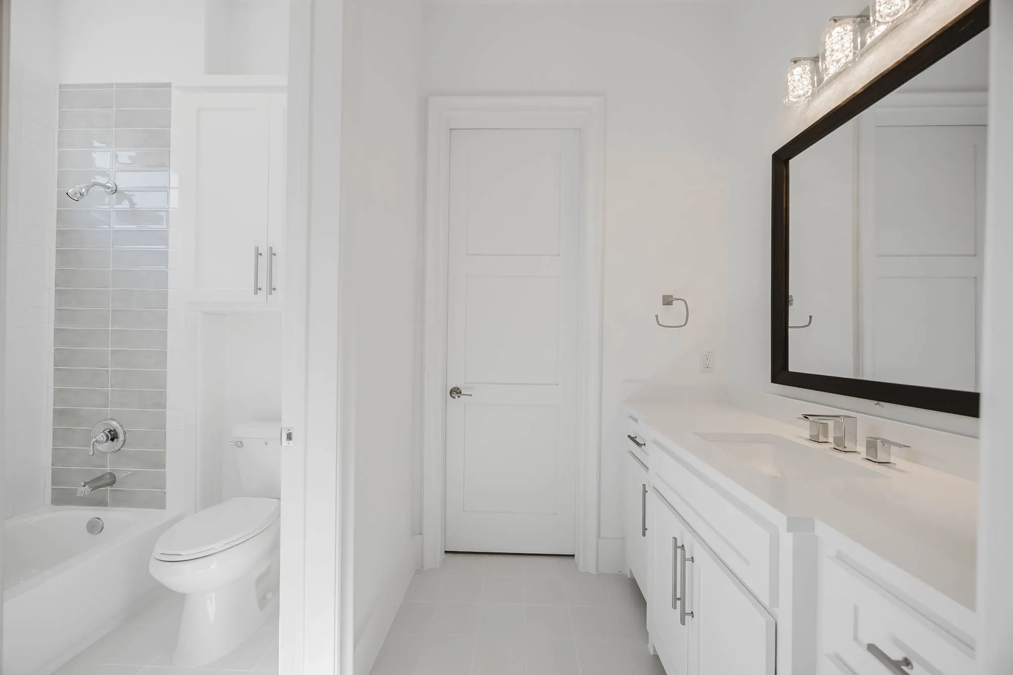 Full bathroom featuring vanity,  shower combination, and light tile patterned floors