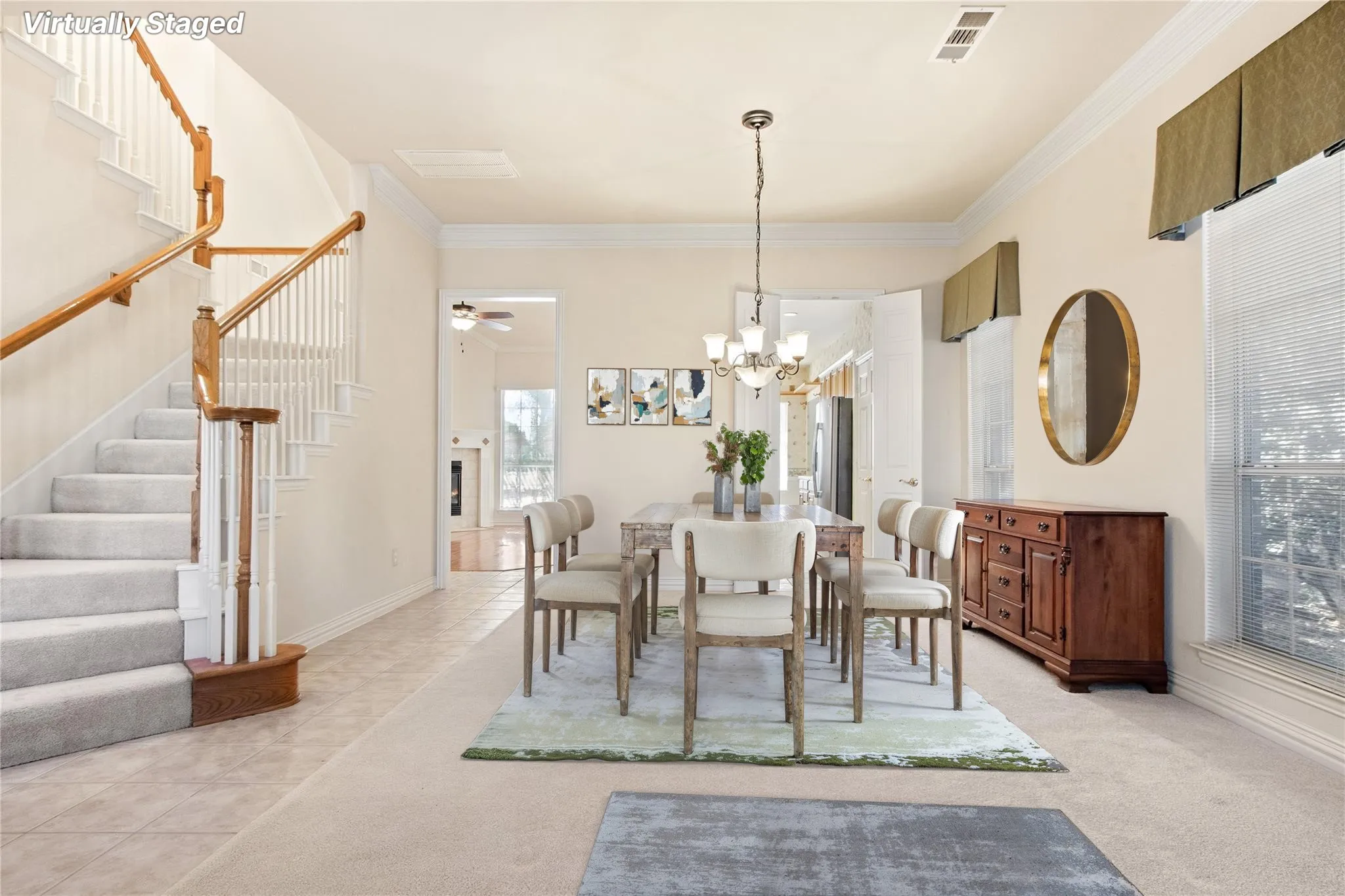 Formal dining space featuring crown molding, a multi-light chandelier, and large windows with blinds