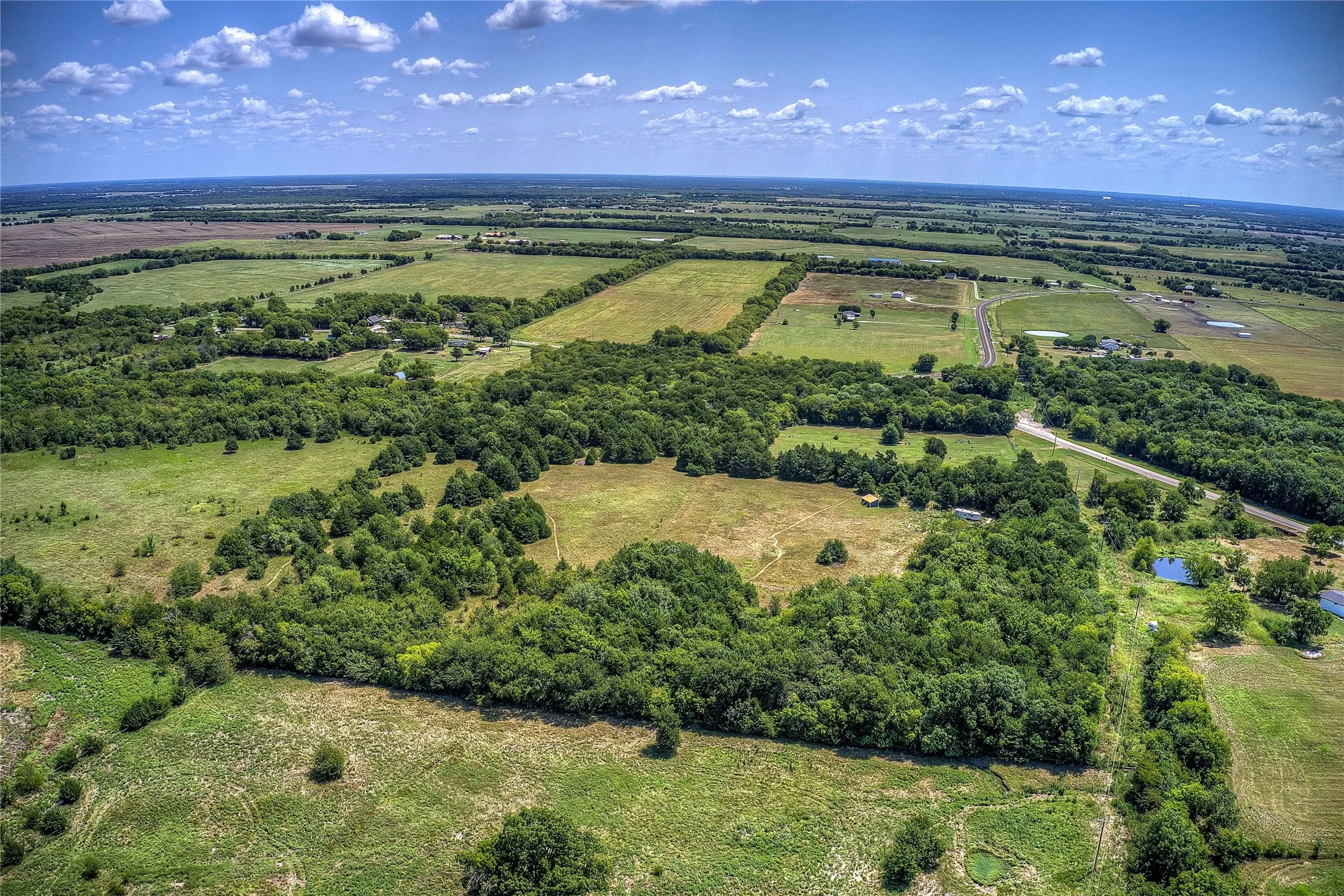 Aerial view of property's location with rural landscape