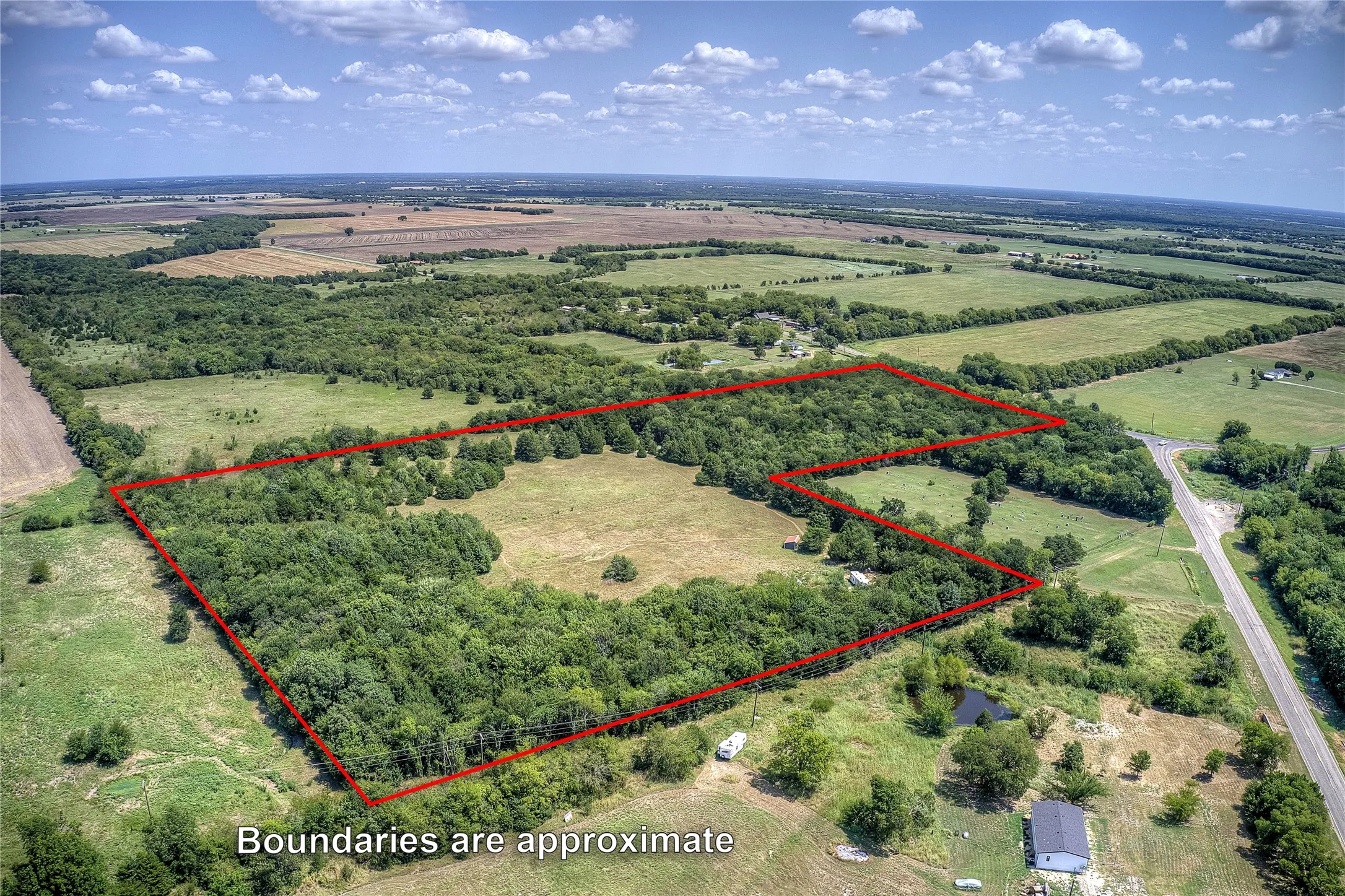 Overview of rural landscape featuring property parcel outlined