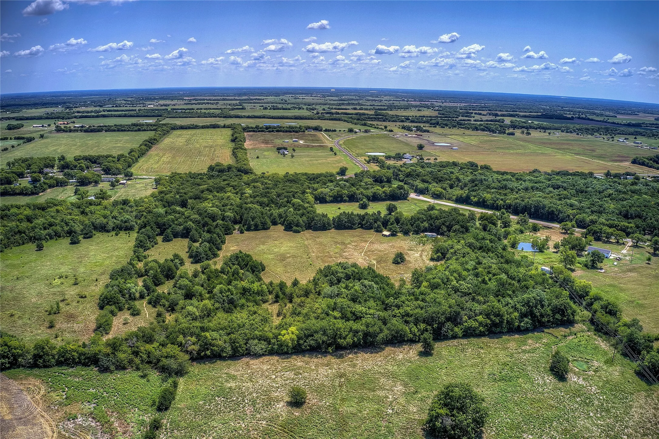 Aerial view of property's location with rural landscape