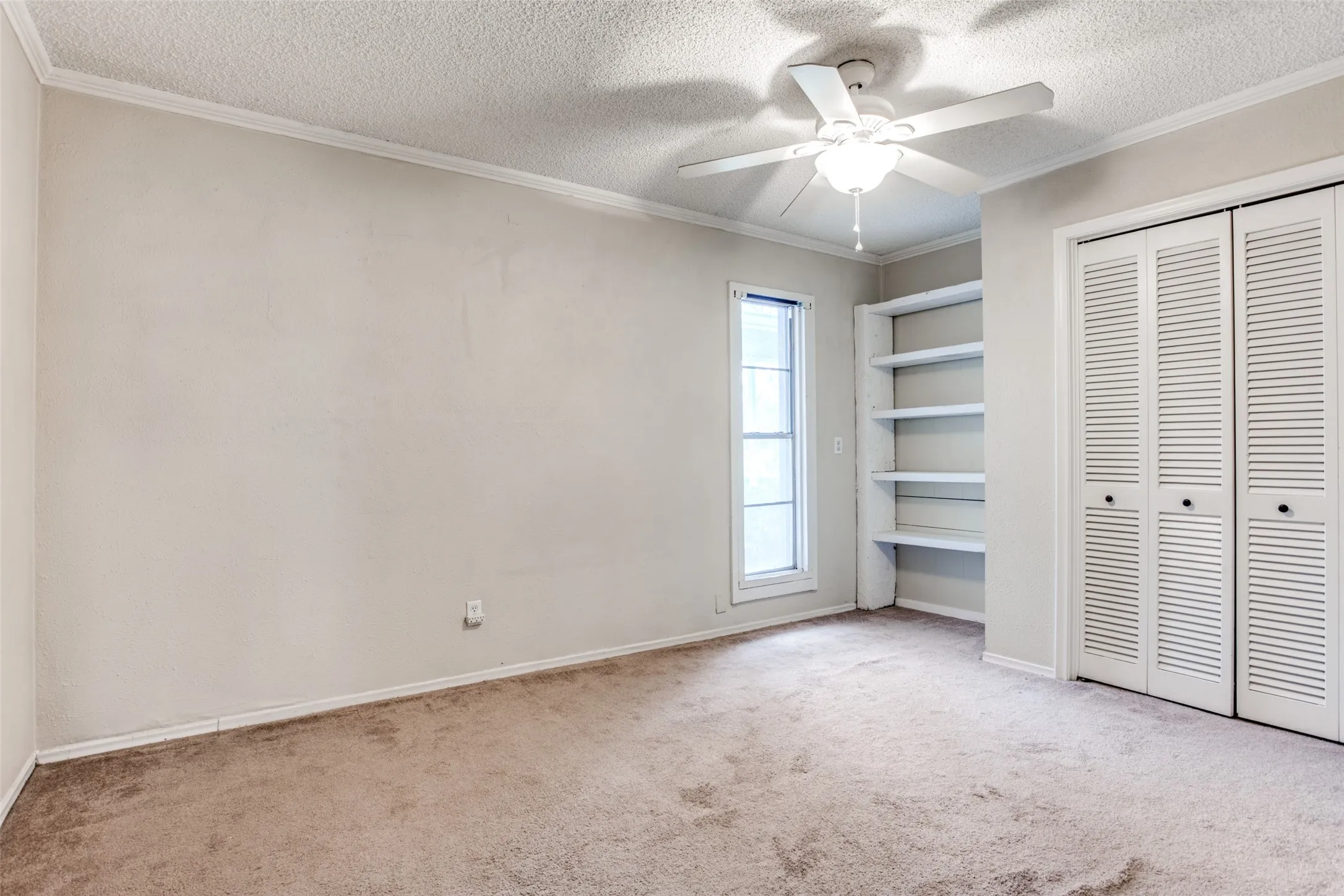 SECONDARY BEDROOM W BUILT SHELVING~