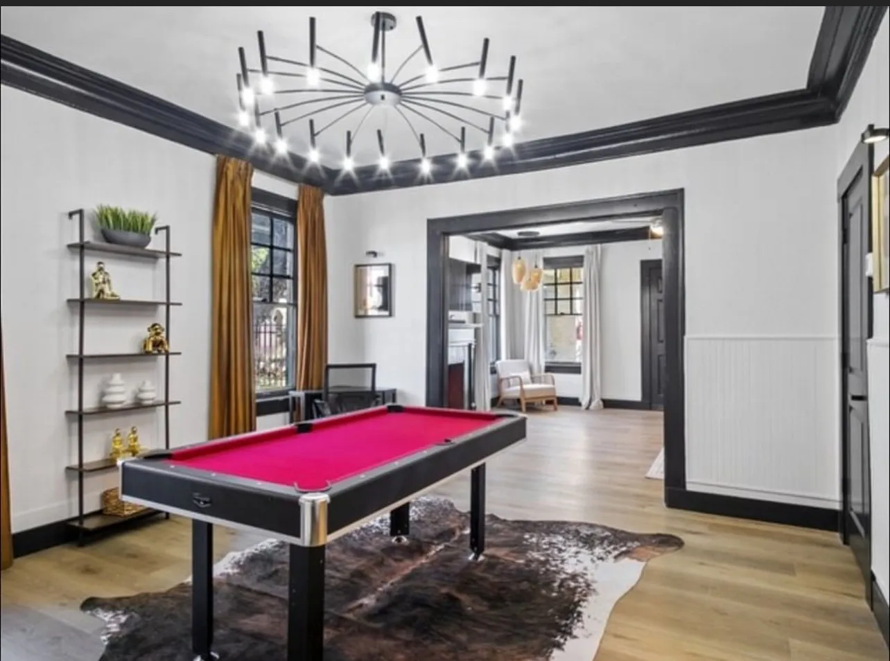 Playroom featuring billiards table, ornamental molding, light wood-style flooring, and wainscoting