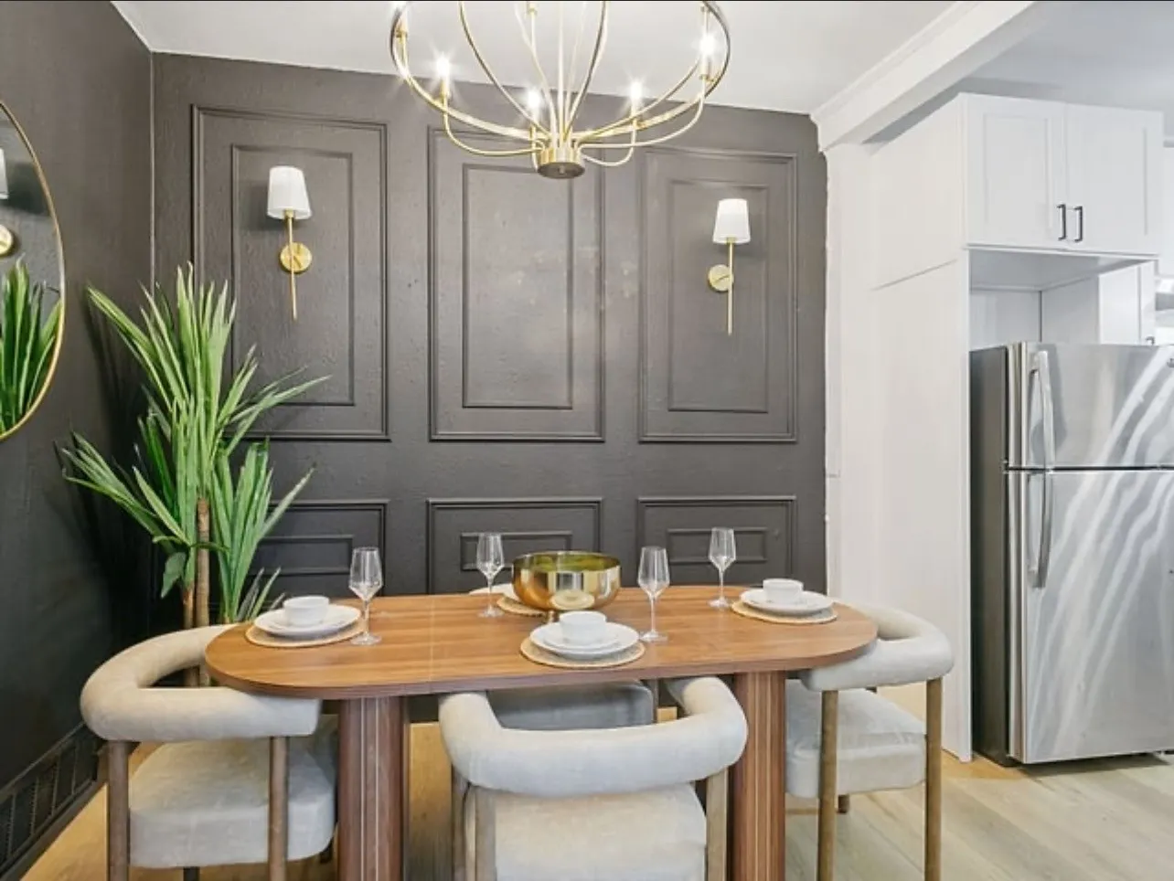 Dining room featuring light wood-style flooring and a chandelier