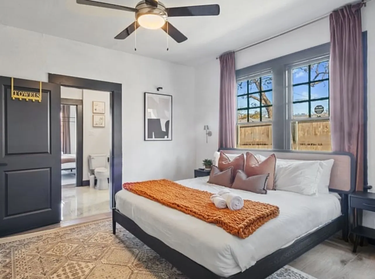 Bedroom with light wood-type flooring and ceiling fan