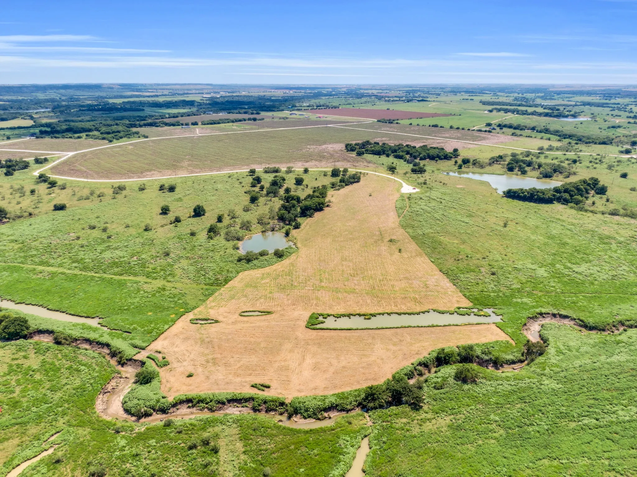 View of property location with rural landscape from the back of the property