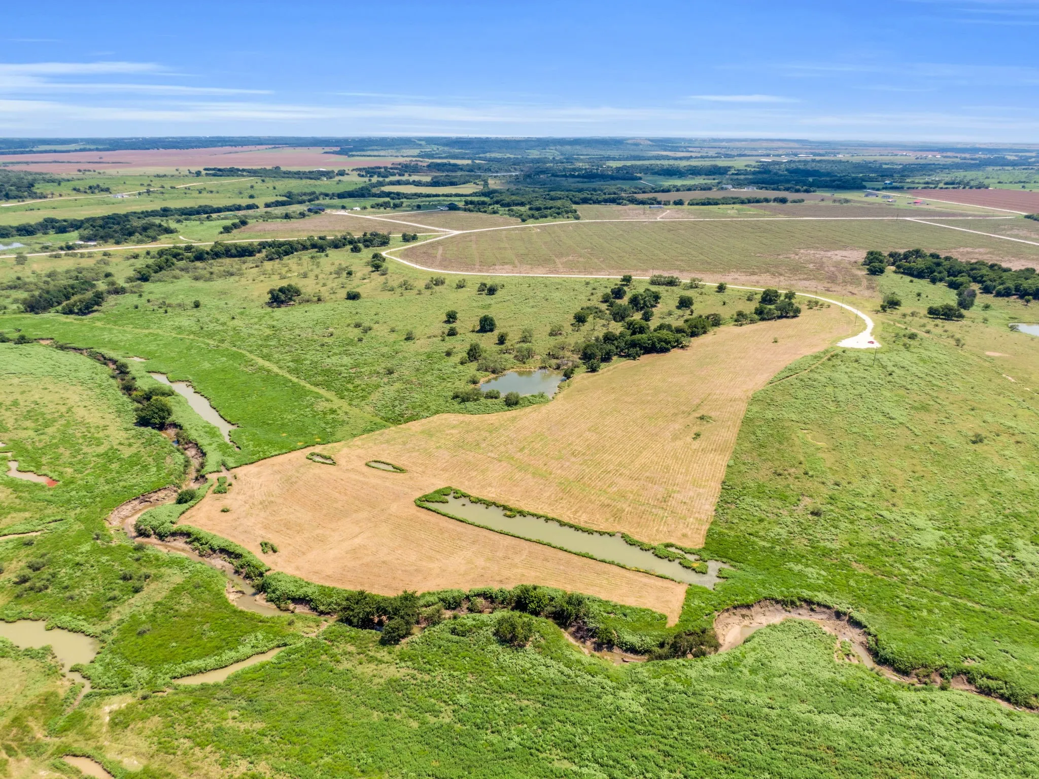 Aerial view of property's location featuring rural landscape