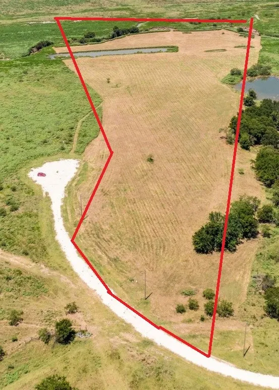 Approximate front view of property boundaries scaled relative to the pond, stream and cul-d-sac