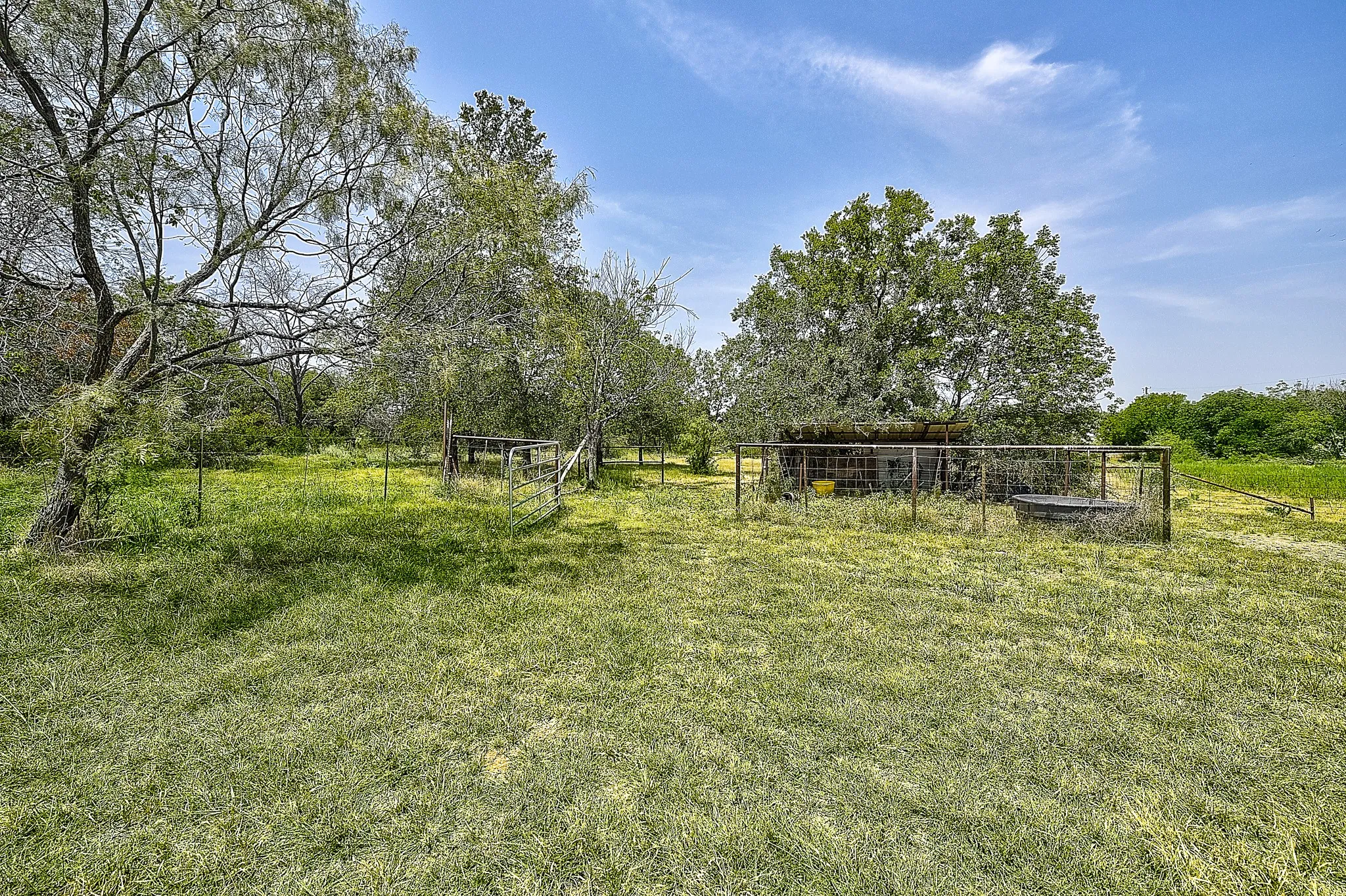 View of yard with a view of countryside and view of wooded area